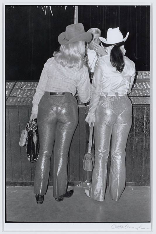 Photo of two women at the Houston Livestock Show 