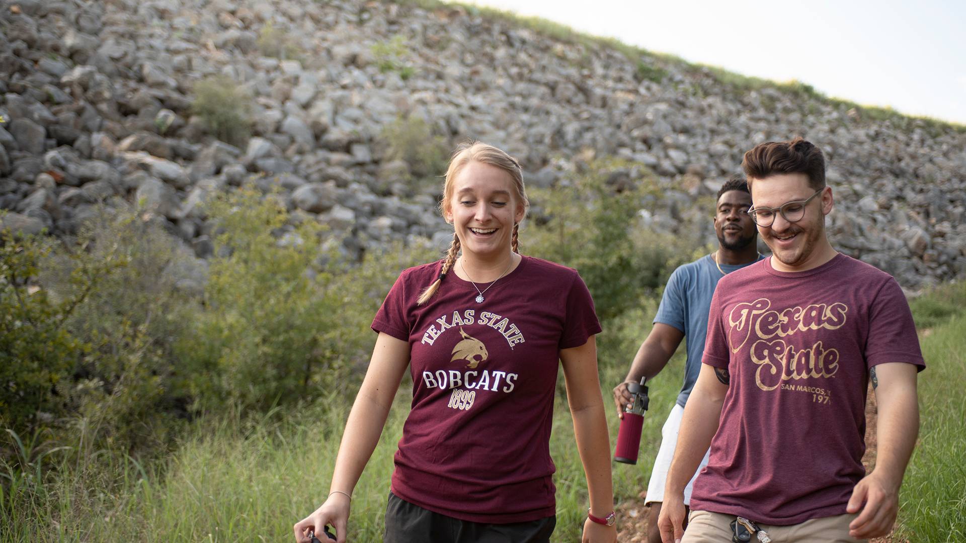 students walking on a nature trail