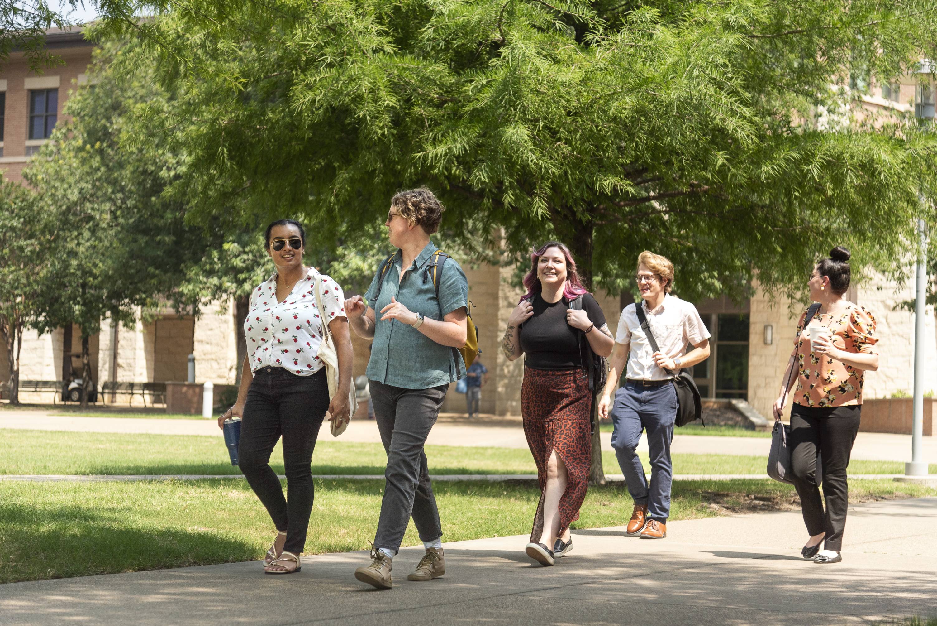students walking outside Avery