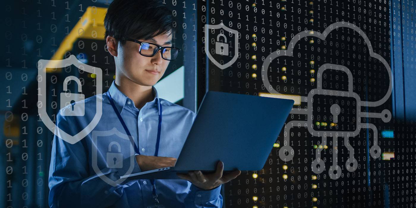 man in glasses holding a laptop with digital representations of data and security floating around him