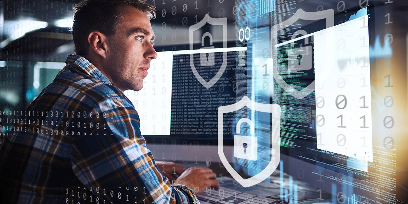 a man looking at a computer screen