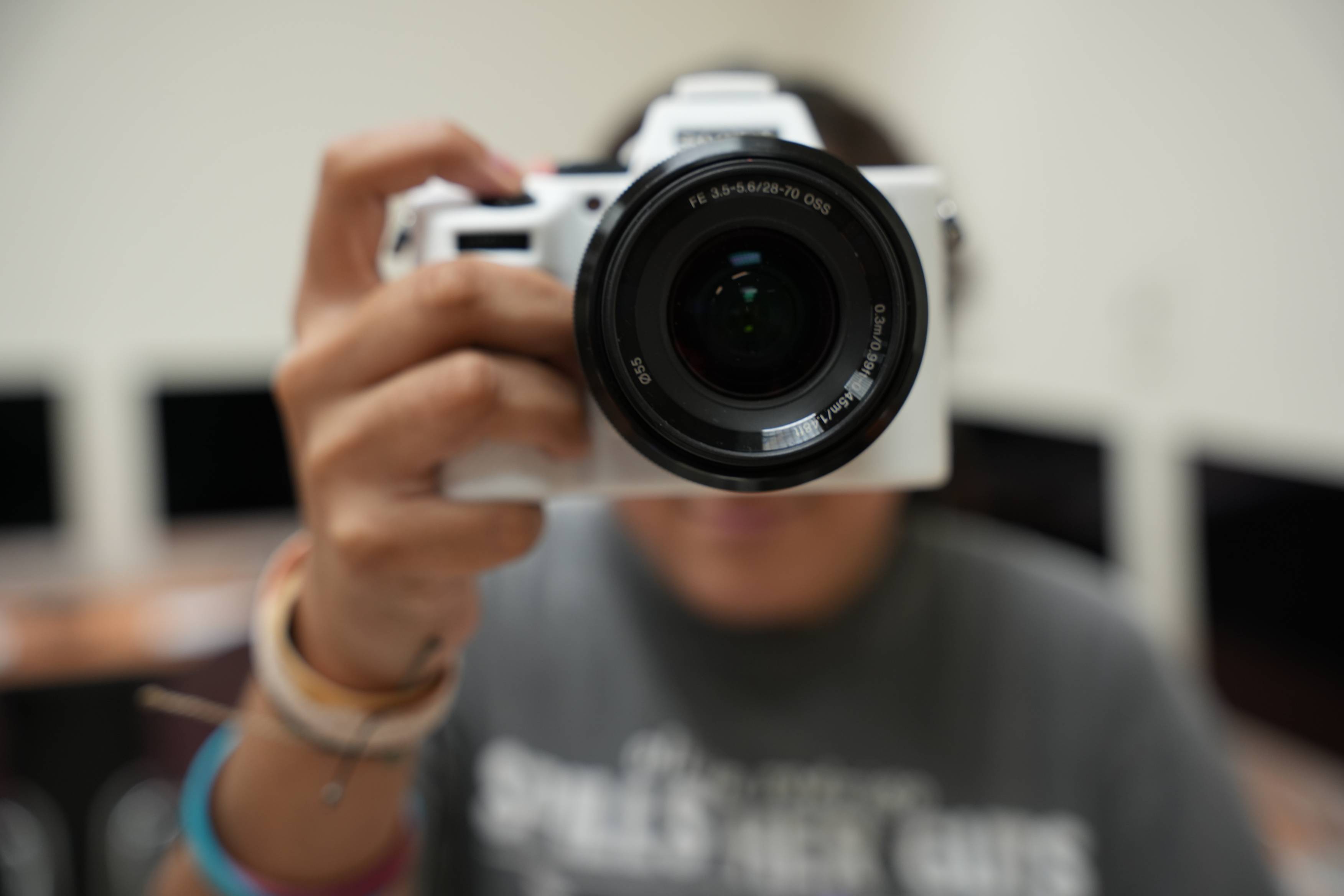 person holding up a camera