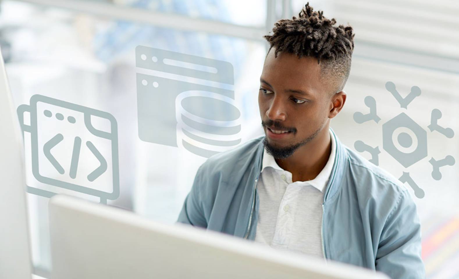 man reading computer screen
