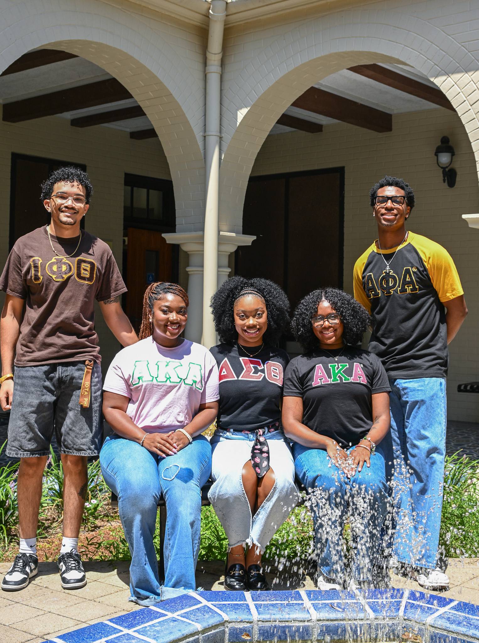 Students posing in courtyard