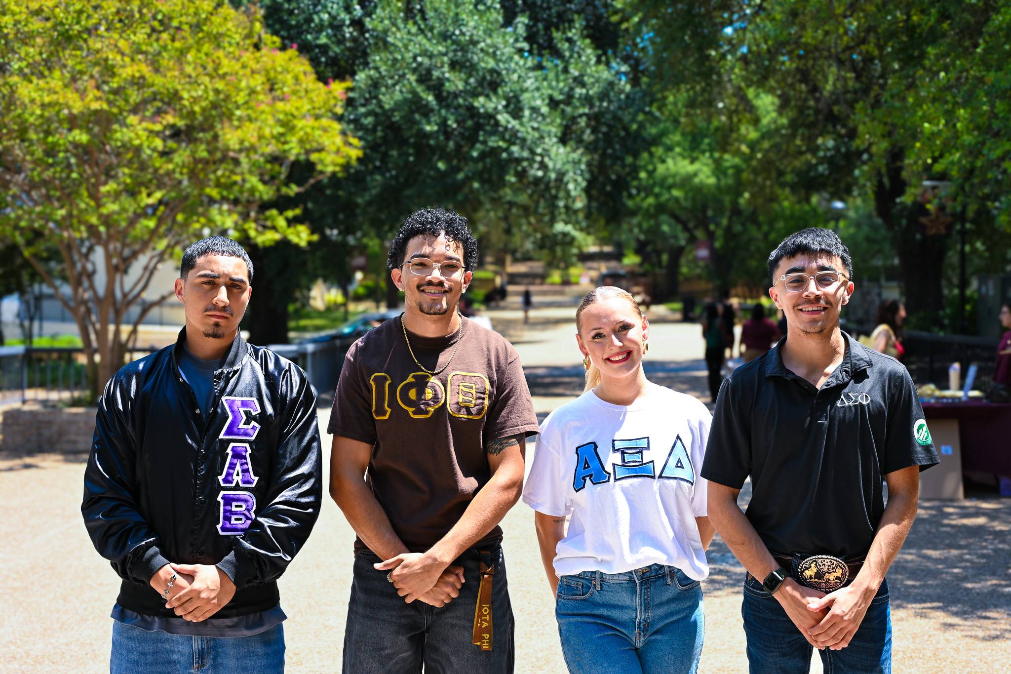 students posing for picture on the quad
