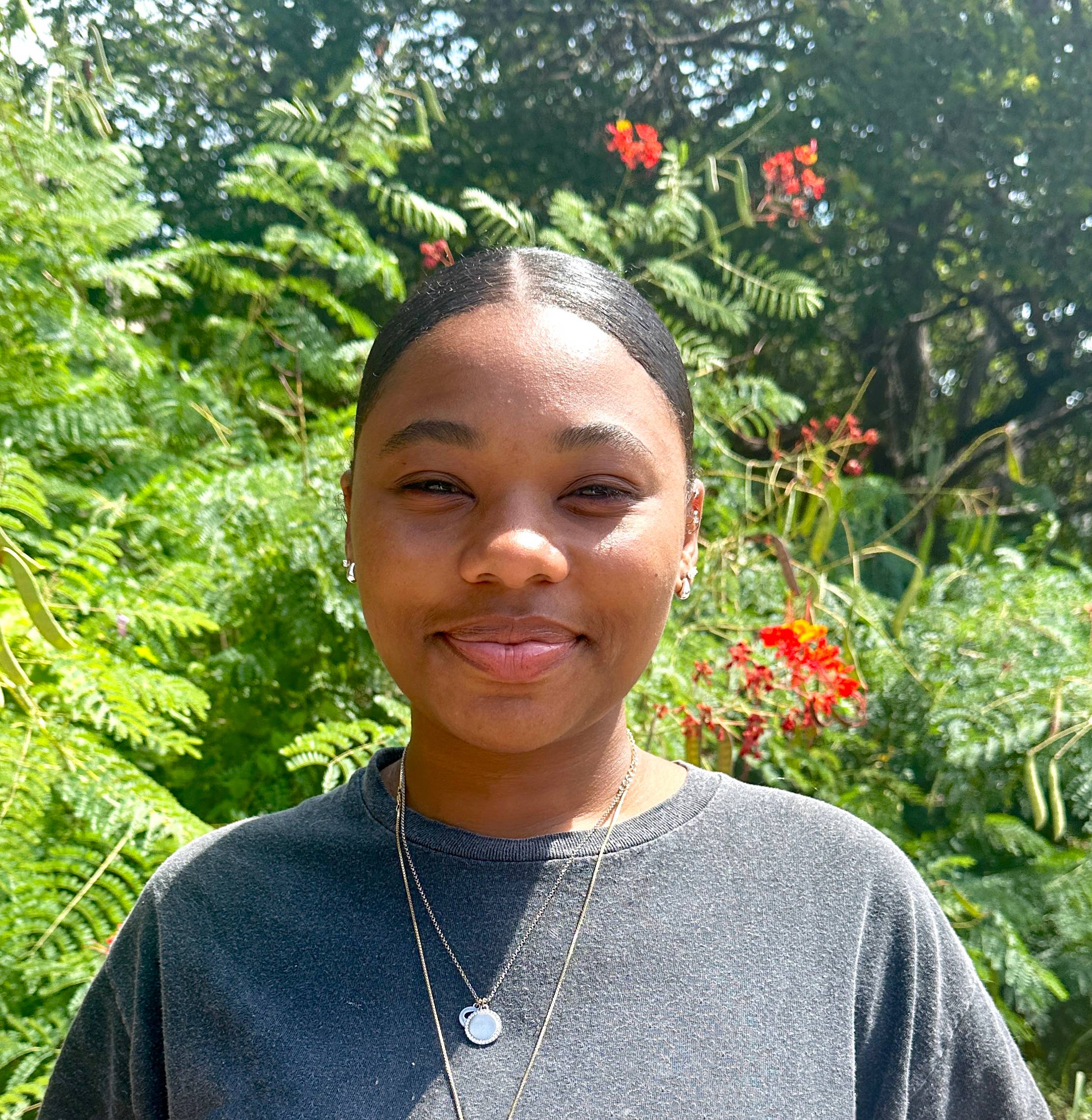 Headshot of Paris Stanfield Mercado smiling.