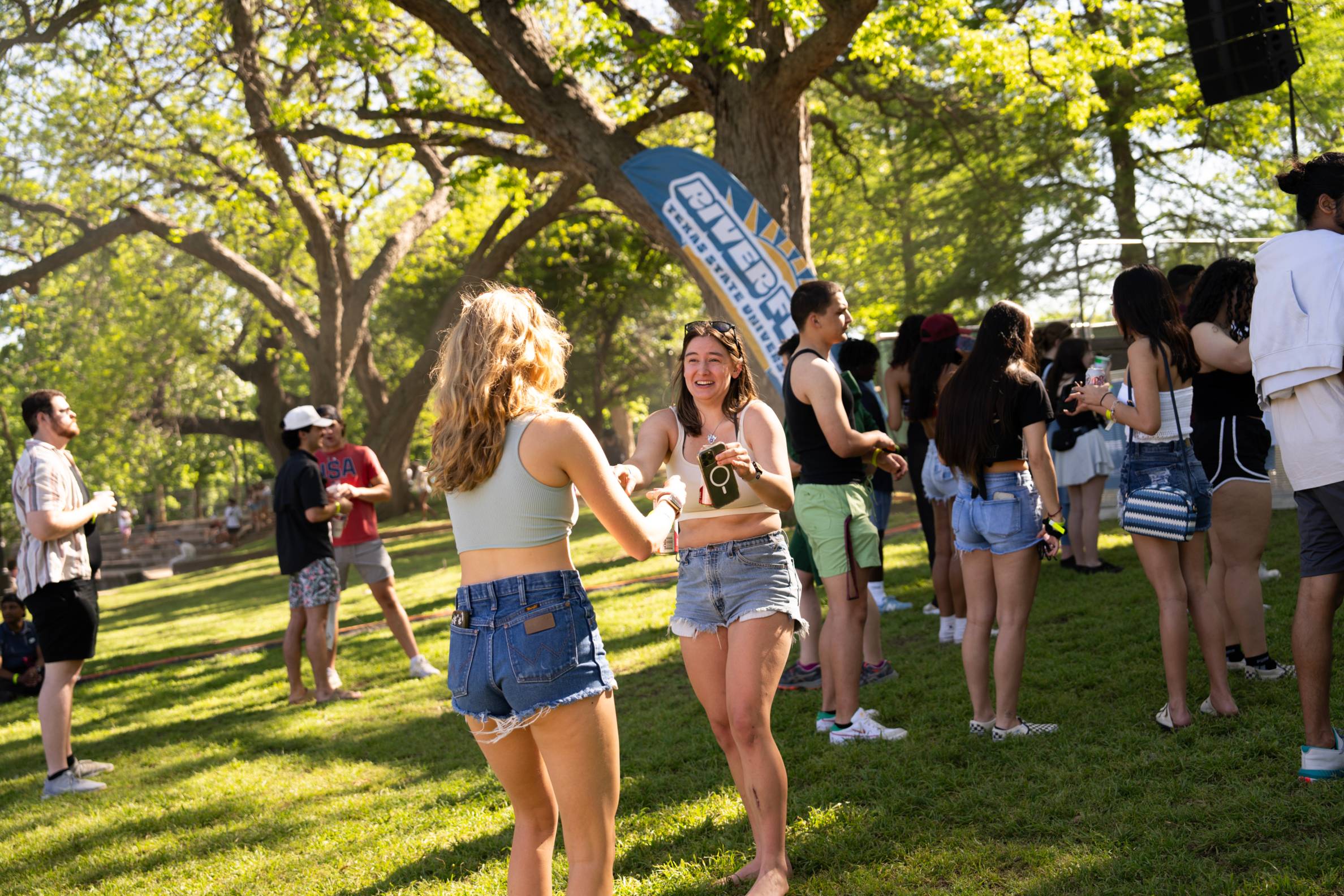 girls dancing outdoors at RiverFest 