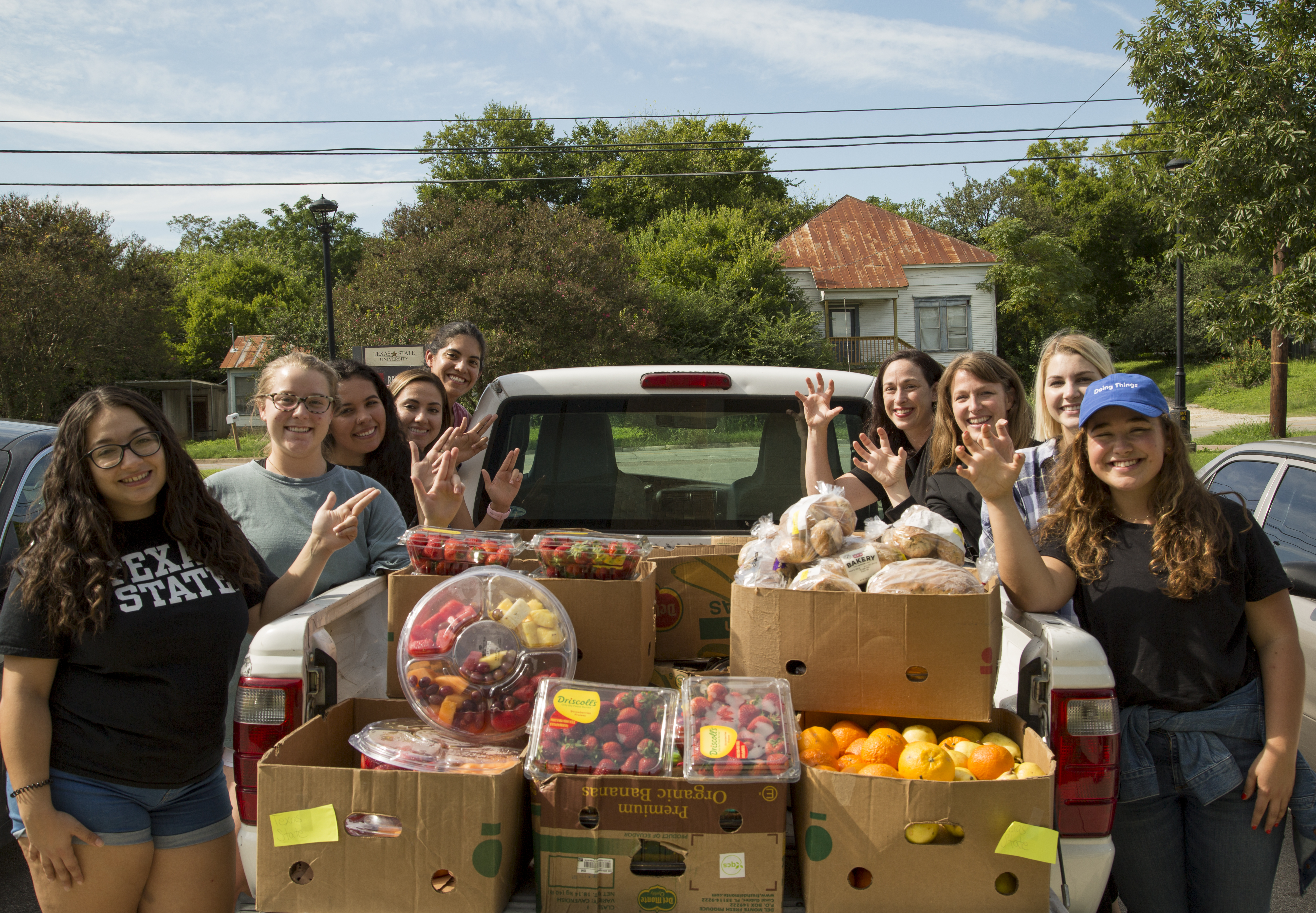 nutrition students with a truckload of produce