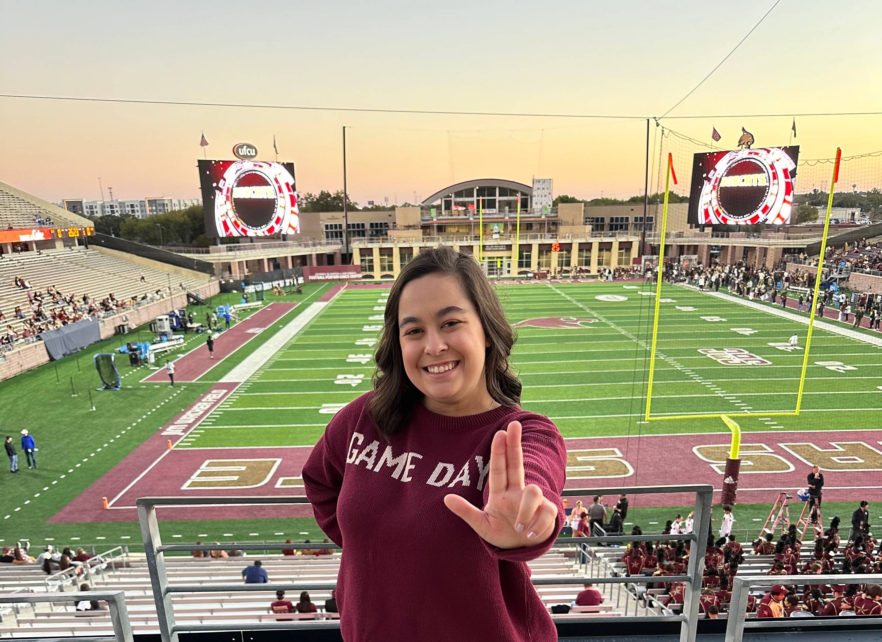 Jasmine holding State's Up