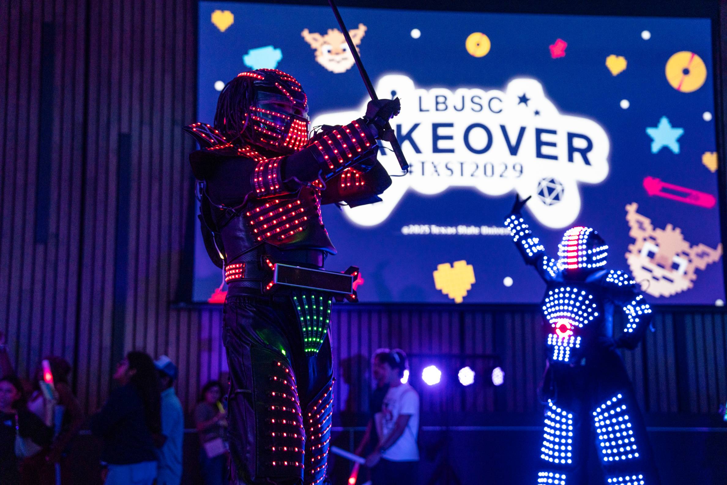 glow in the dark stilt walkers 