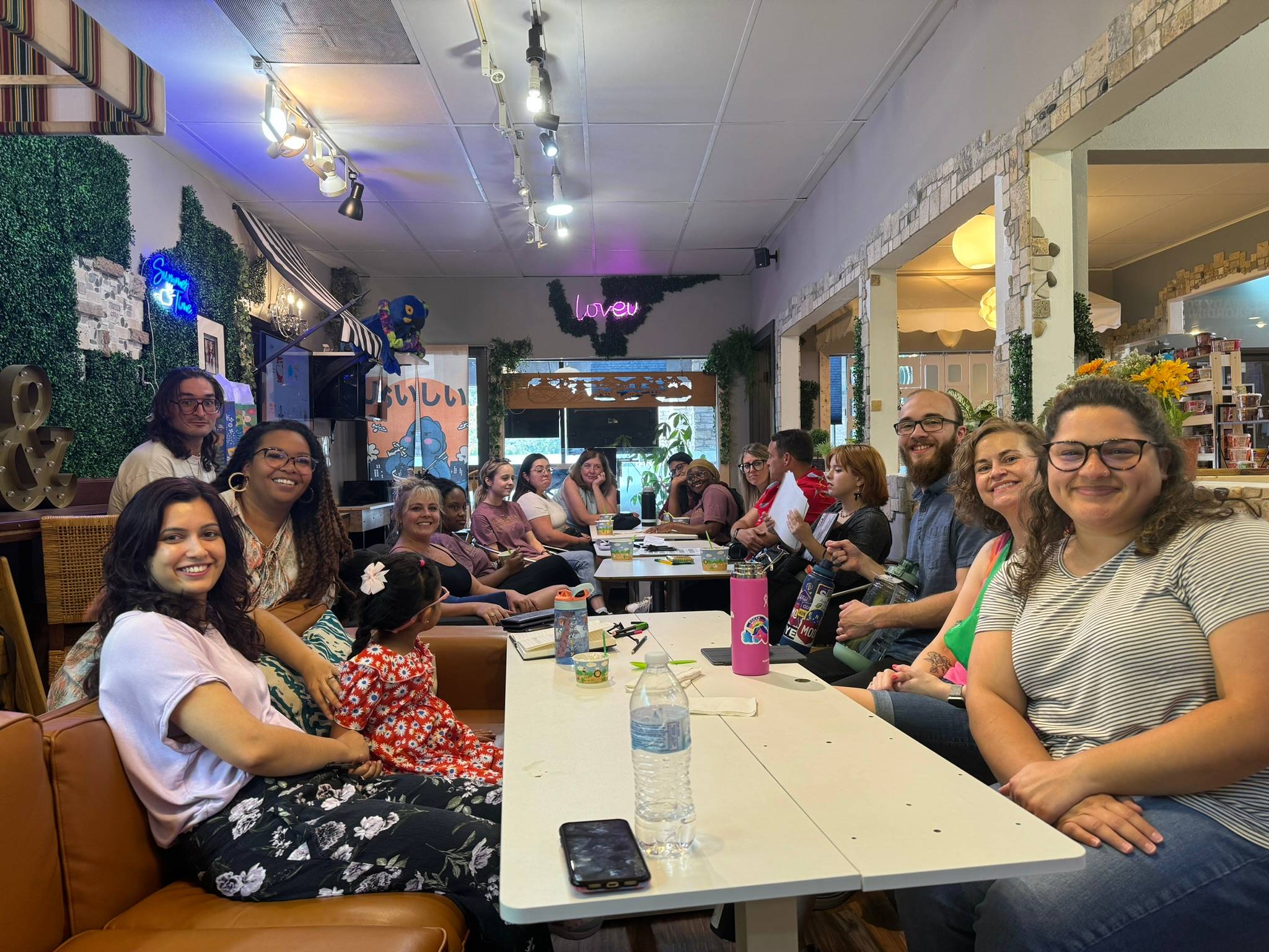 Comm Studies Graduates Celebrating in their graduation robes