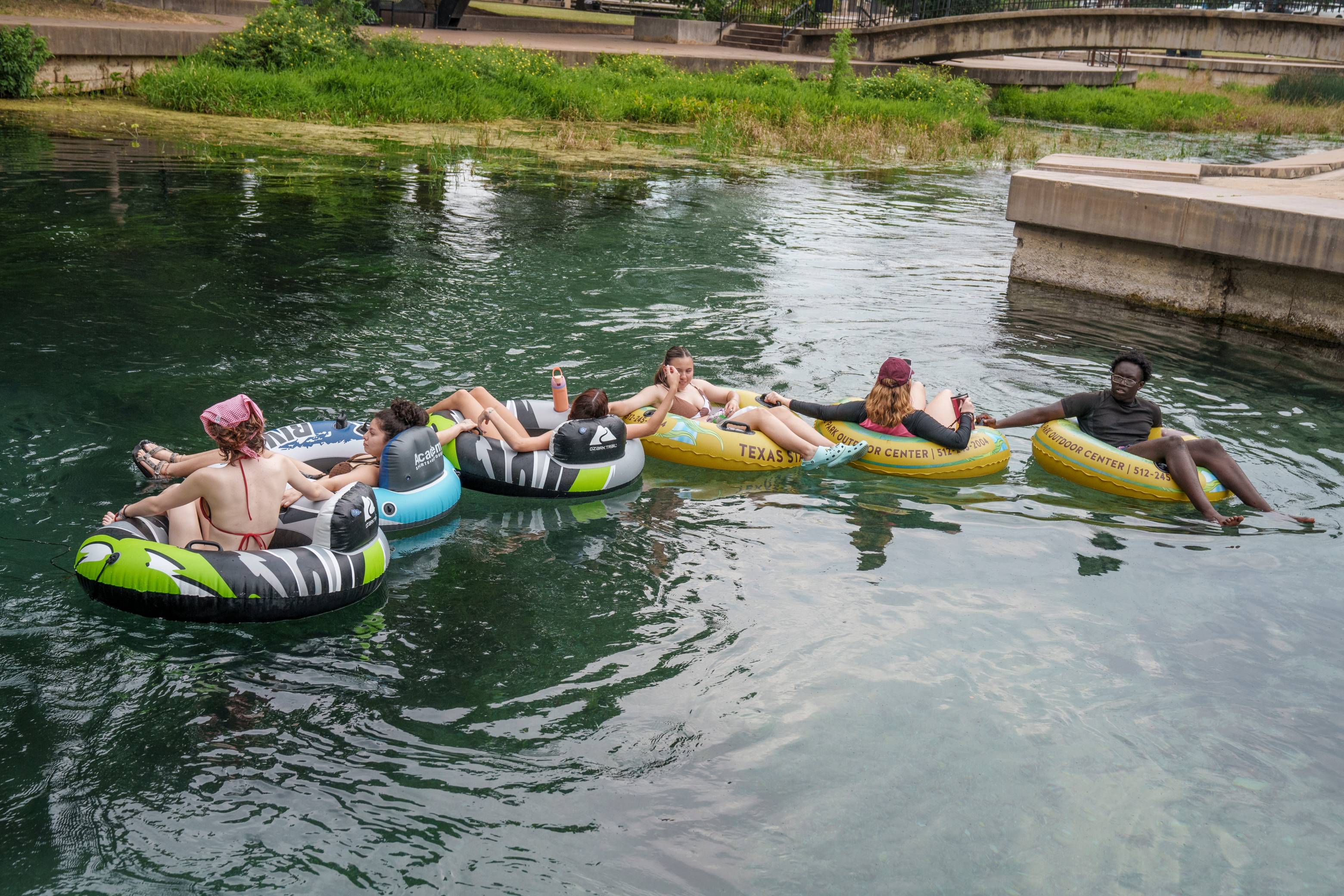 txst students floating the river at sewell park
