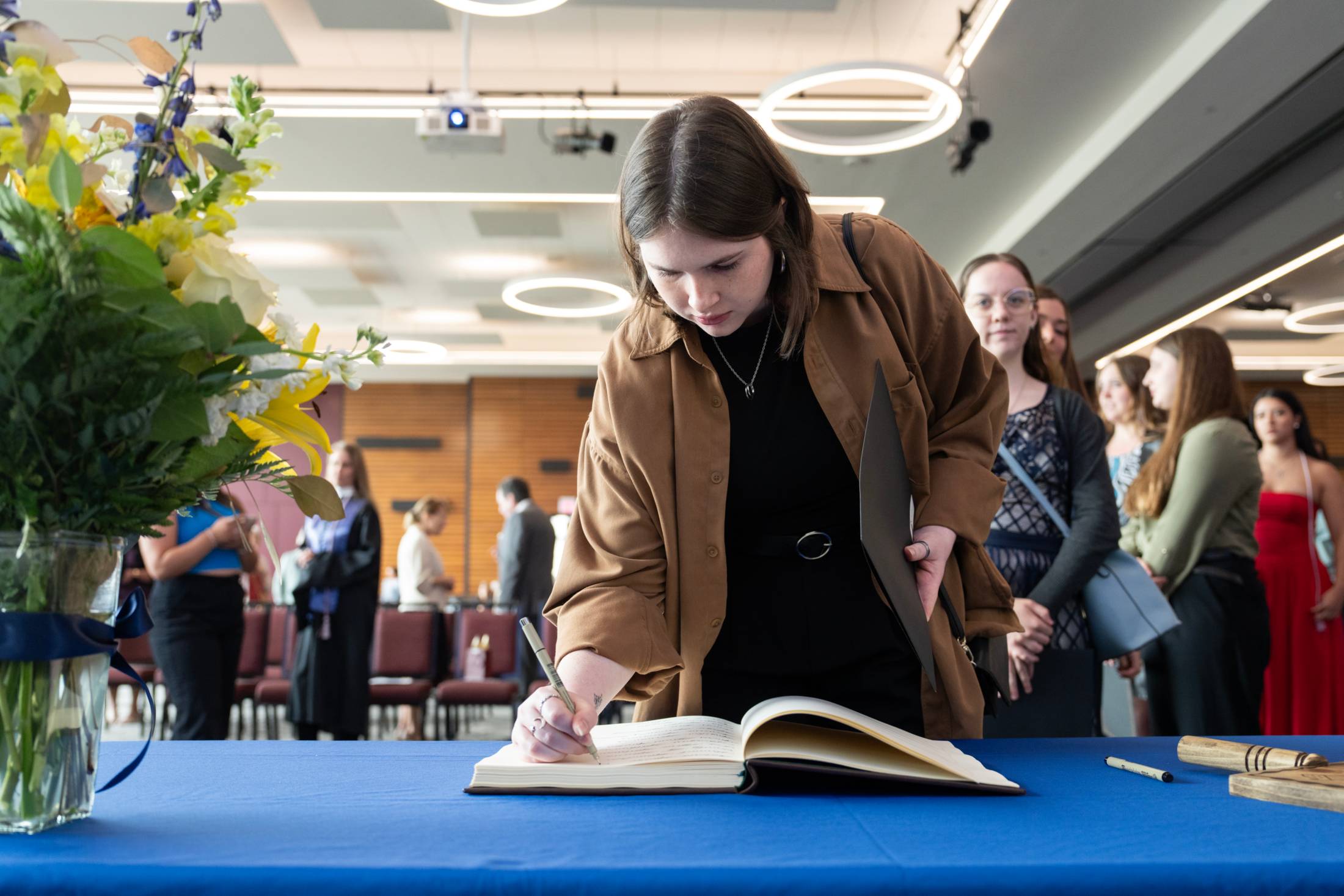 PBK student member signing in book