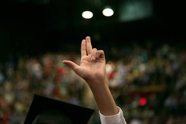 hand holding up two fingers