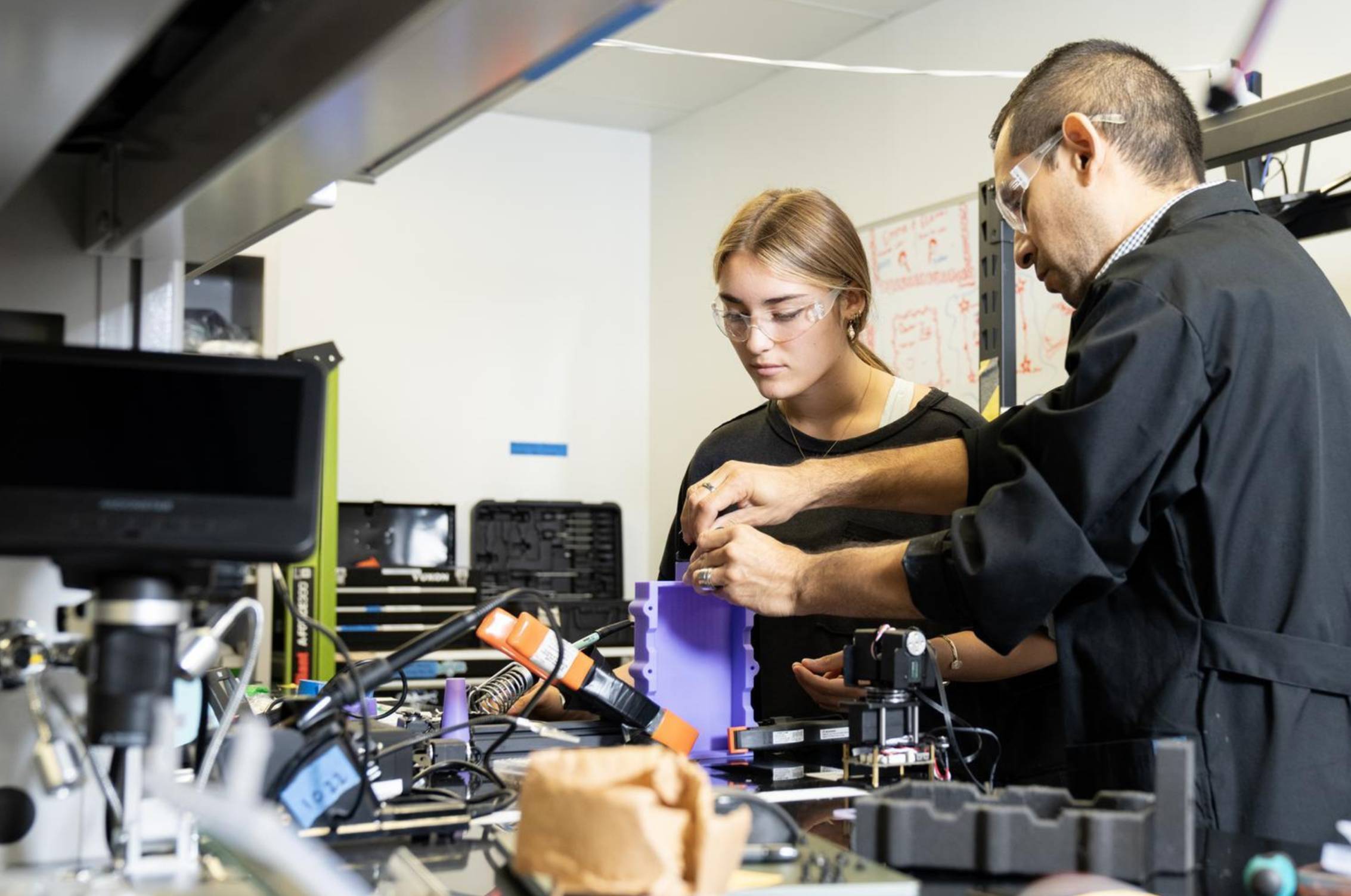 people working in lab.
