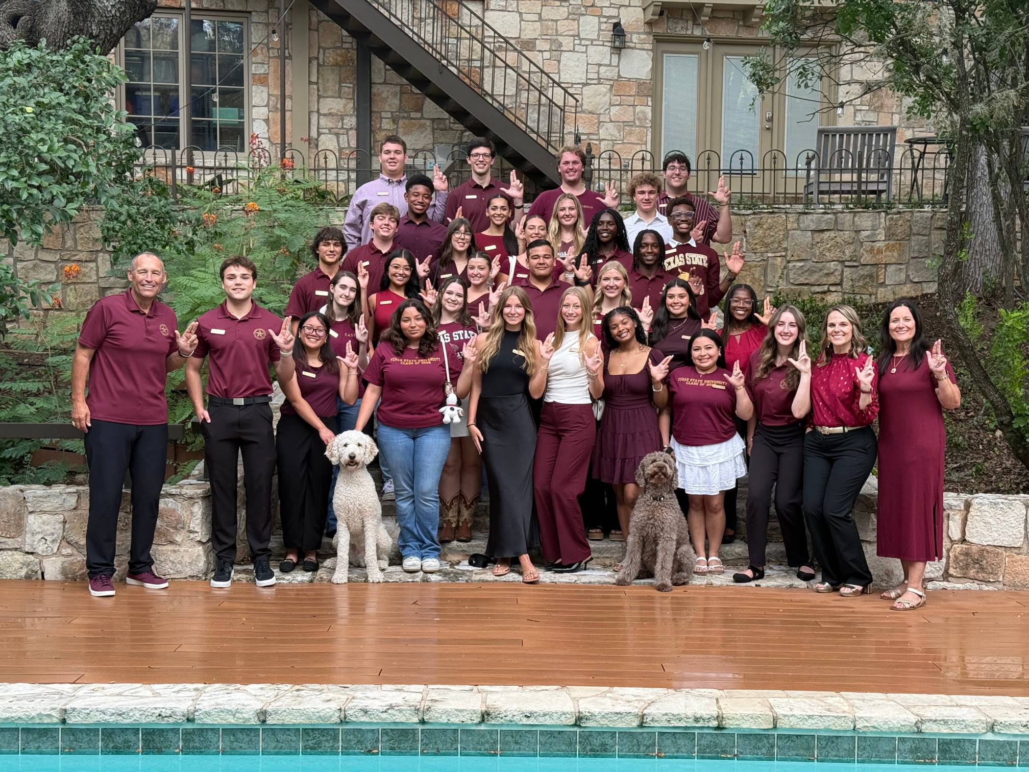 large group of people standing on stairs for a group photo