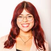 headshot of young woman with red hair