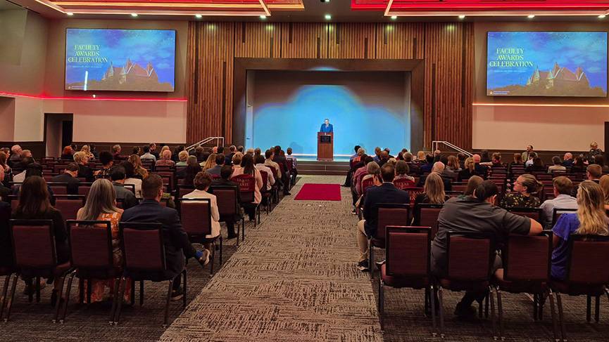 President Kelly Damphousse speaks to faculty members at the awards ceremony.
