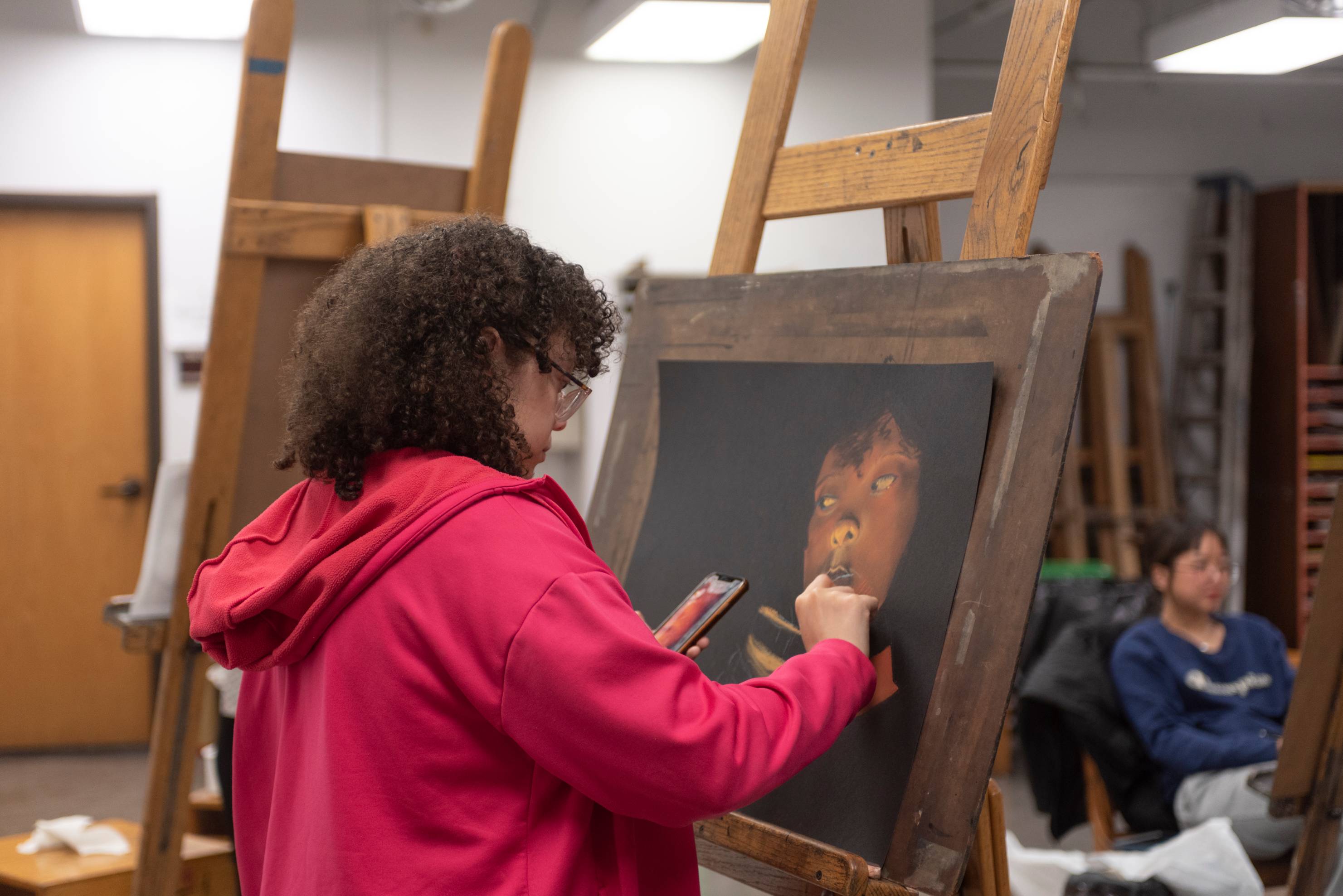 Artist working on an art piece.