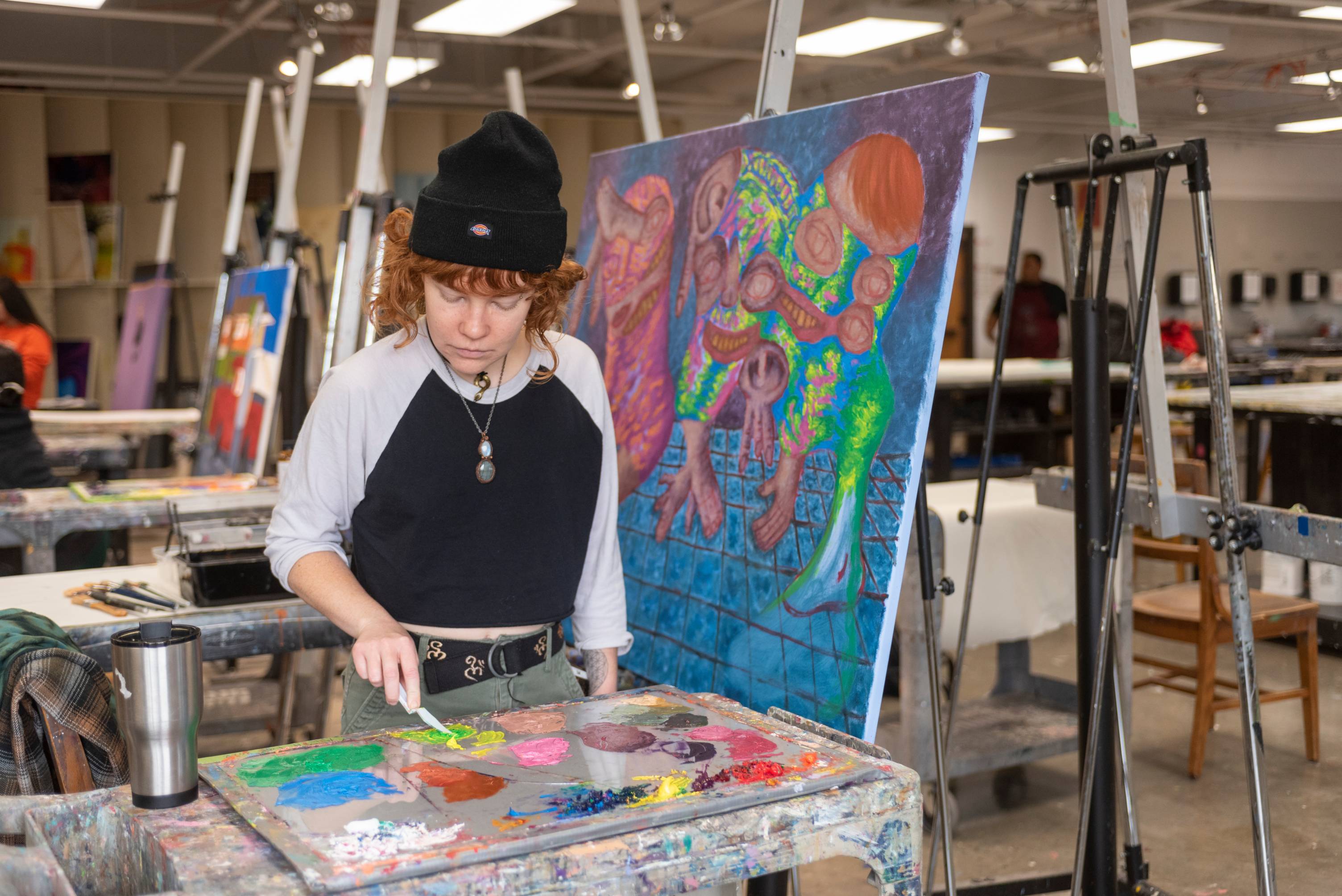 Artist working on an art piece.