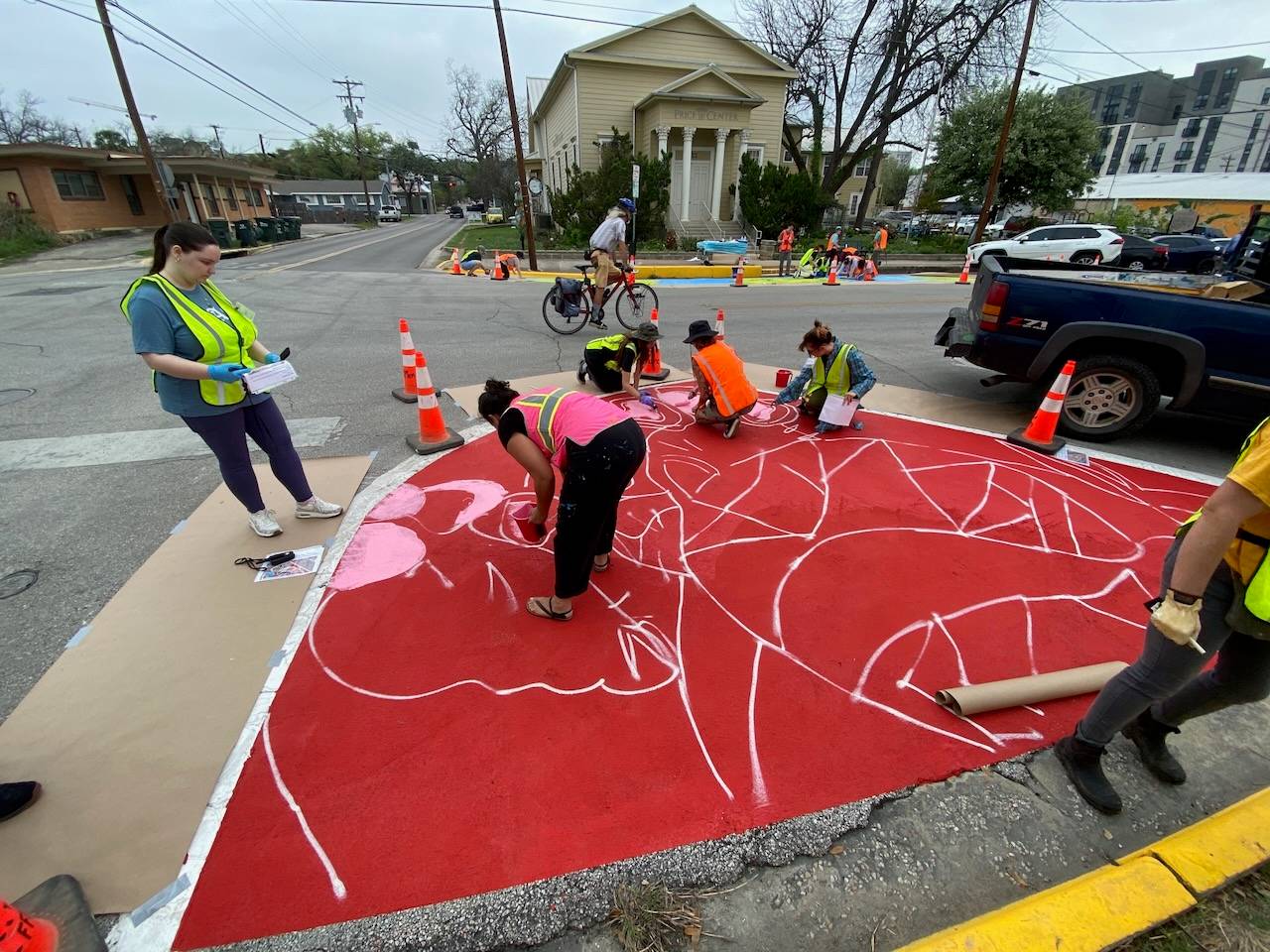Students and community install San Marcos murals.