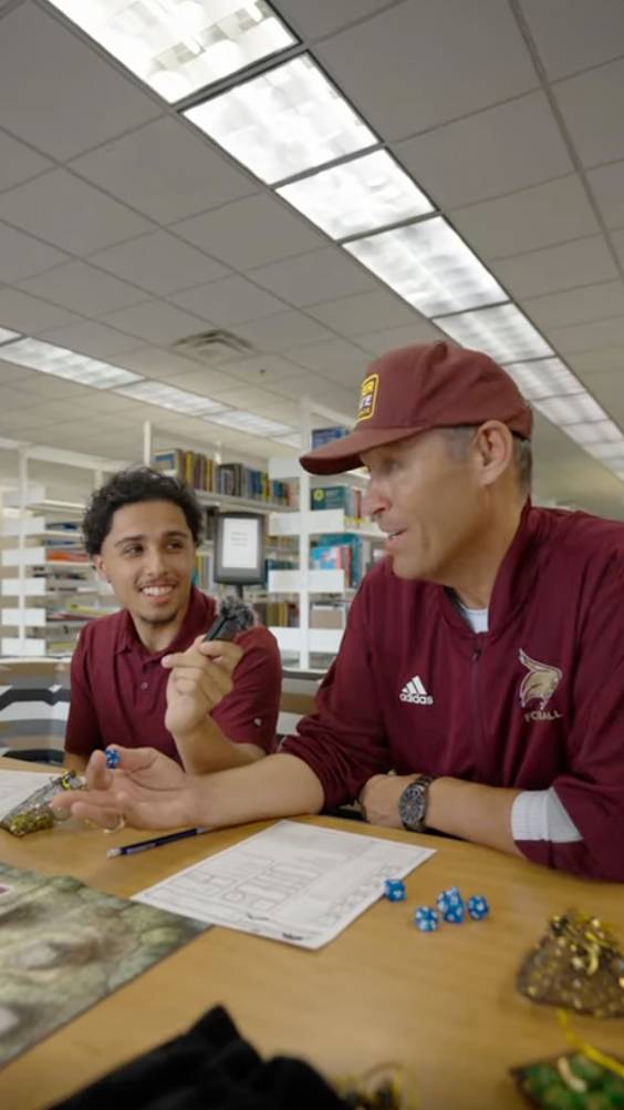 Tyson and President Damphousse try to roll some critical hits with a D&D group at TXST.