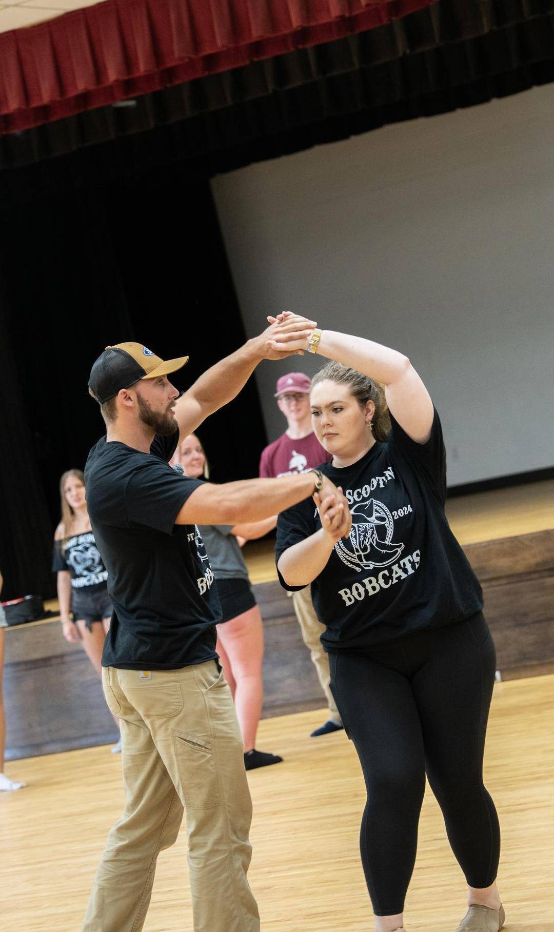 The Try @ TXST team samples country dancing with the Boot Scootin' Bobcats.