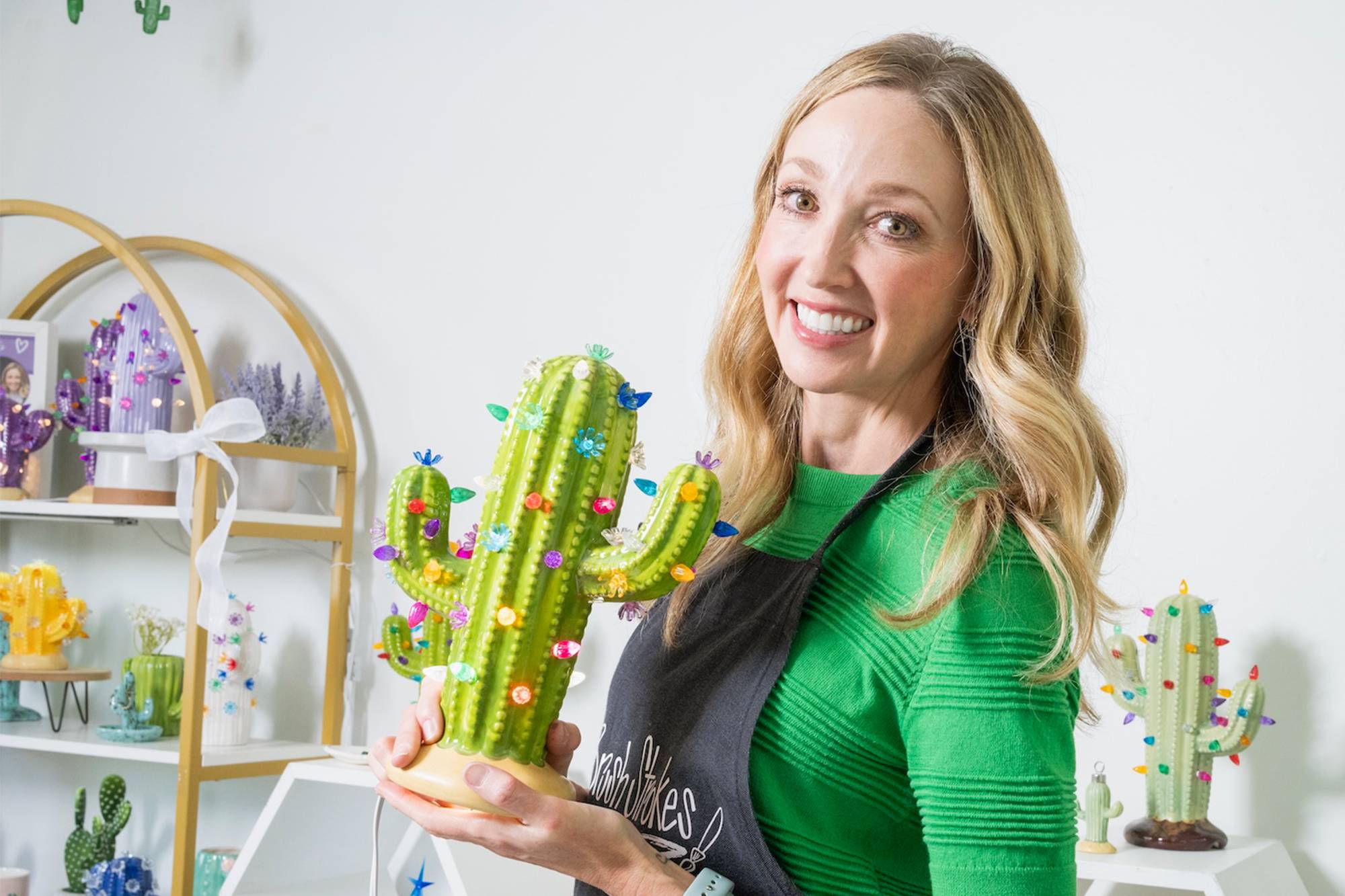 Courtney Harding Joyner with one of her ceramic cacti