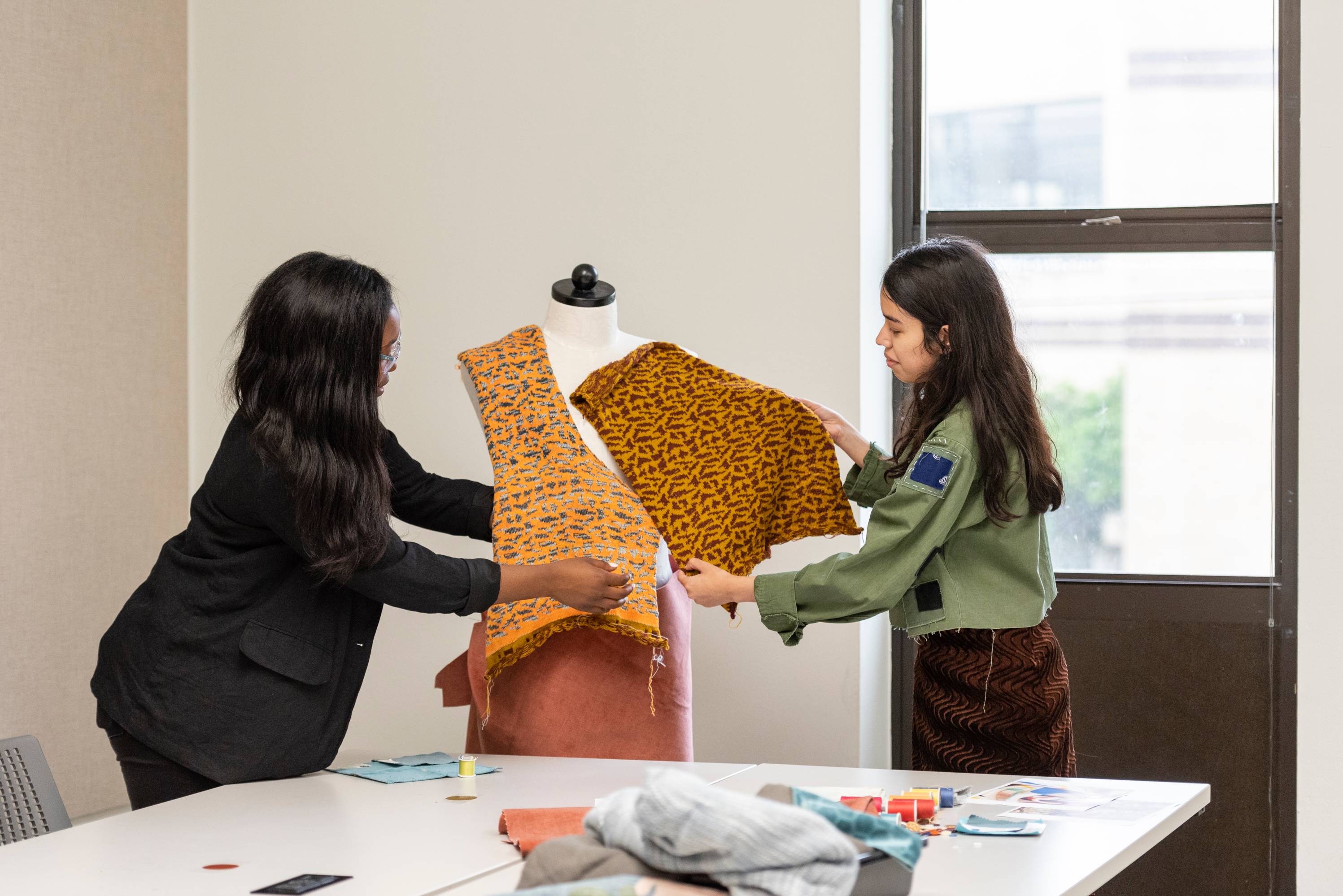 People setting up a display.