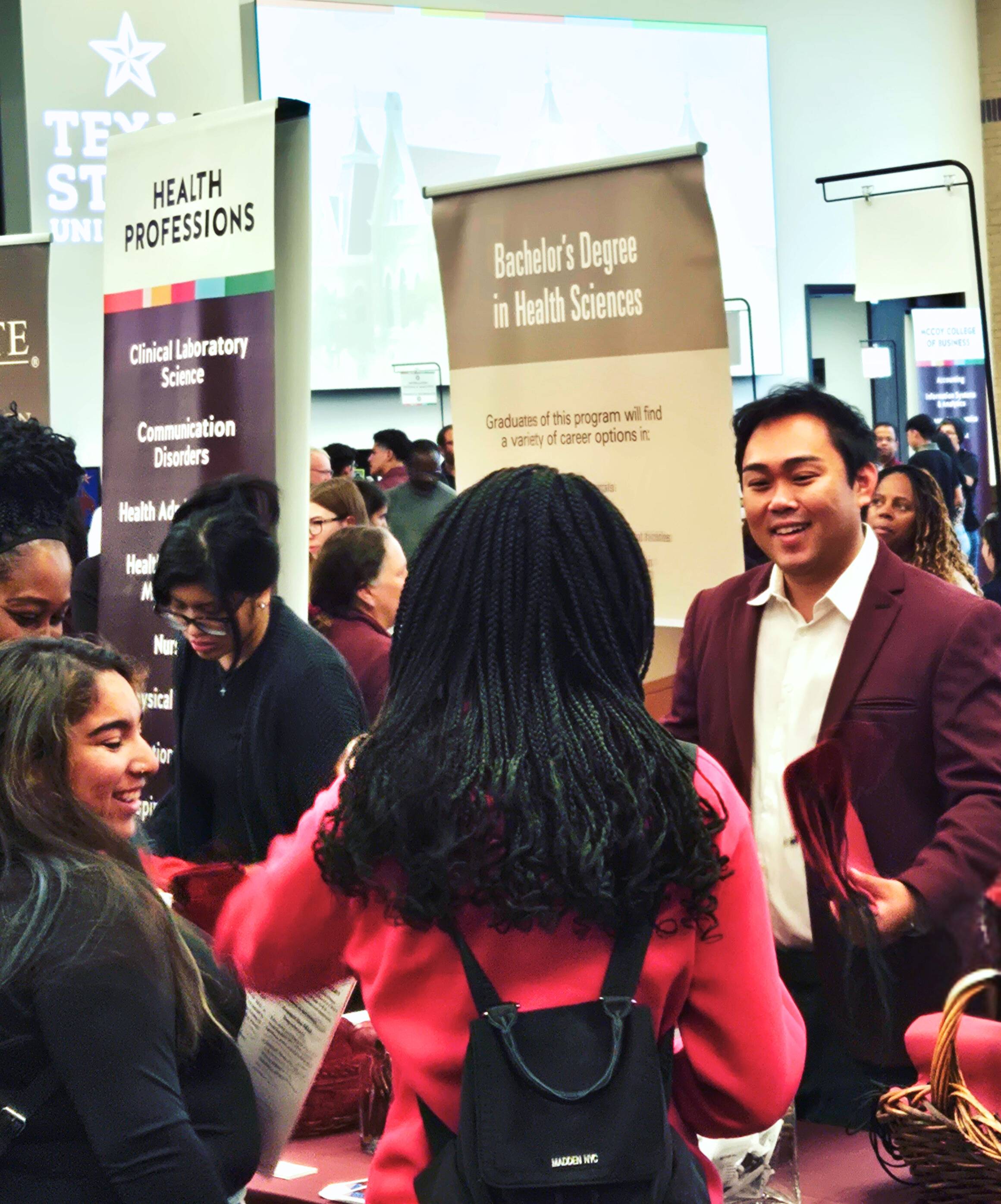 Dr. Kumura interacting with students on Bobcat Day