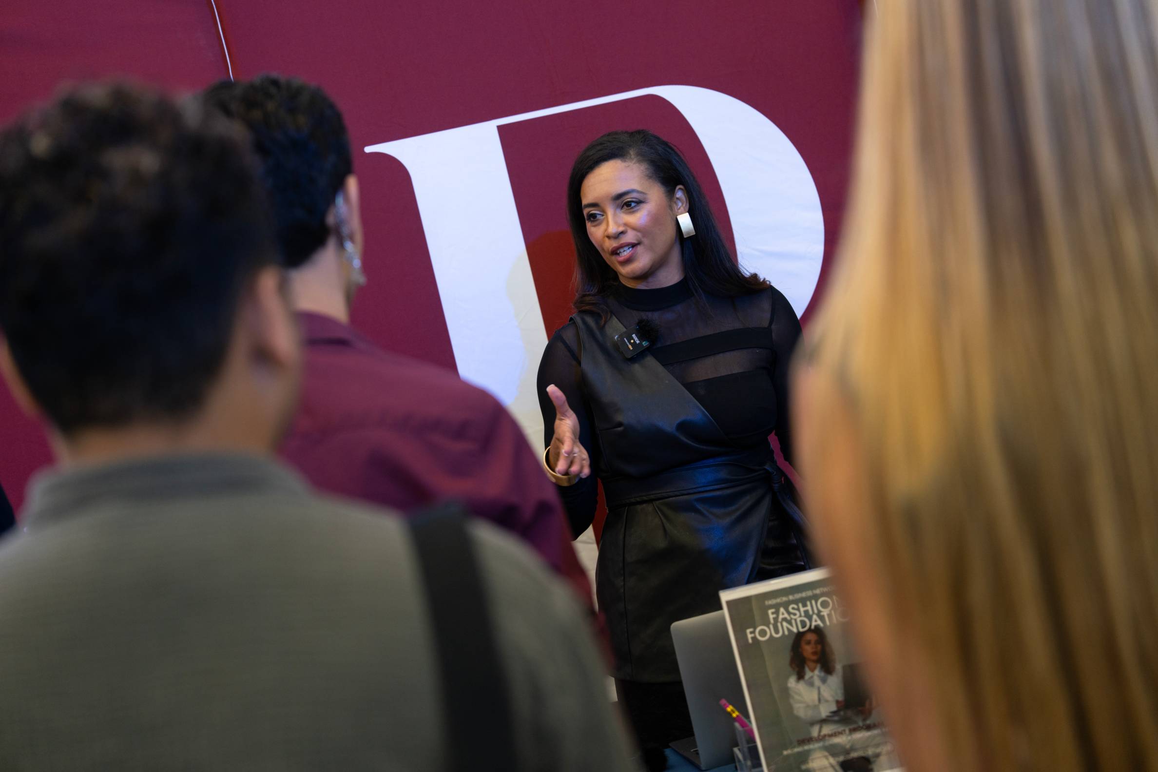 Business representative speaking to student