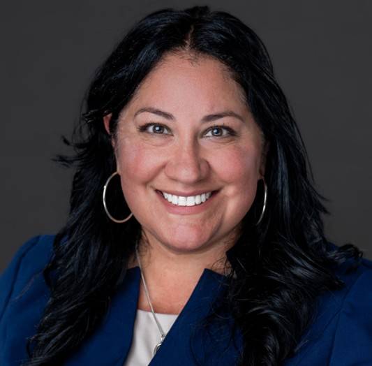 smiling woman with brown hair