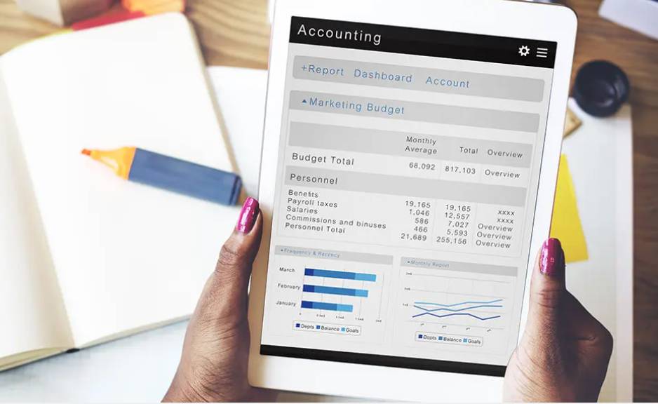 a man holding a tablet containing accounting information