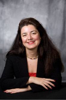 a smiling woman in headshot