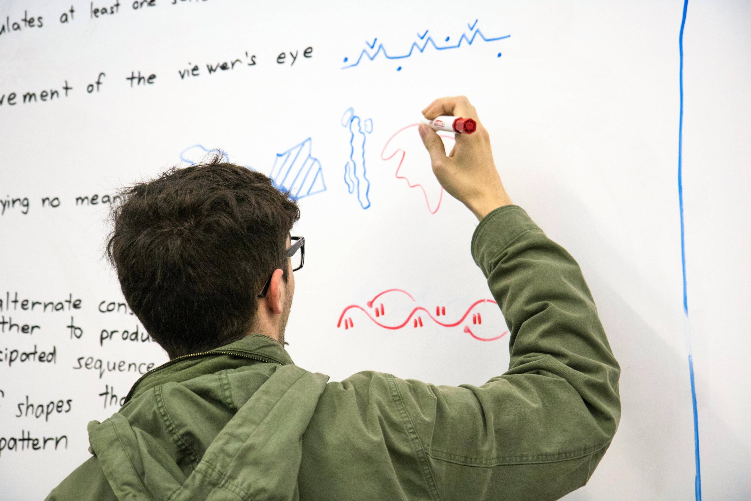 Individuals on the computer with a headset