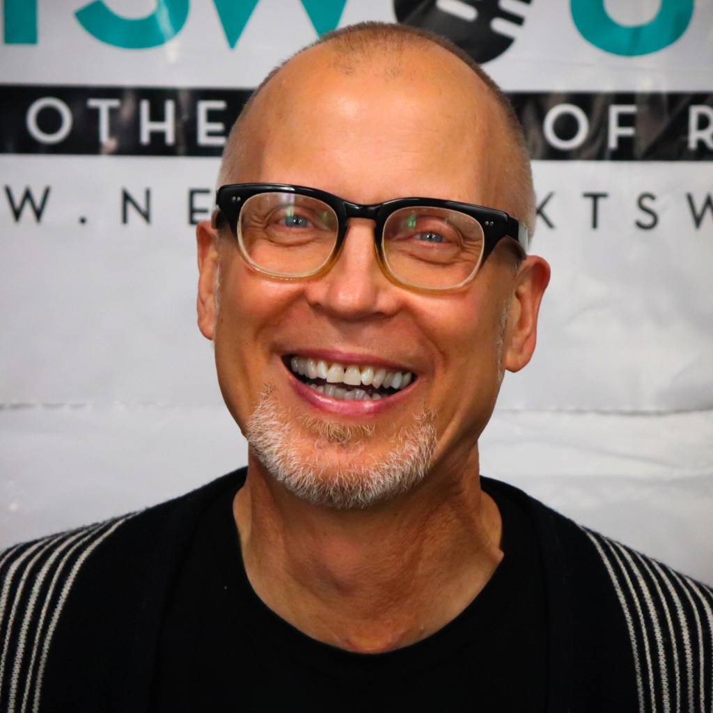 headshot of a a male at an awards ceremony