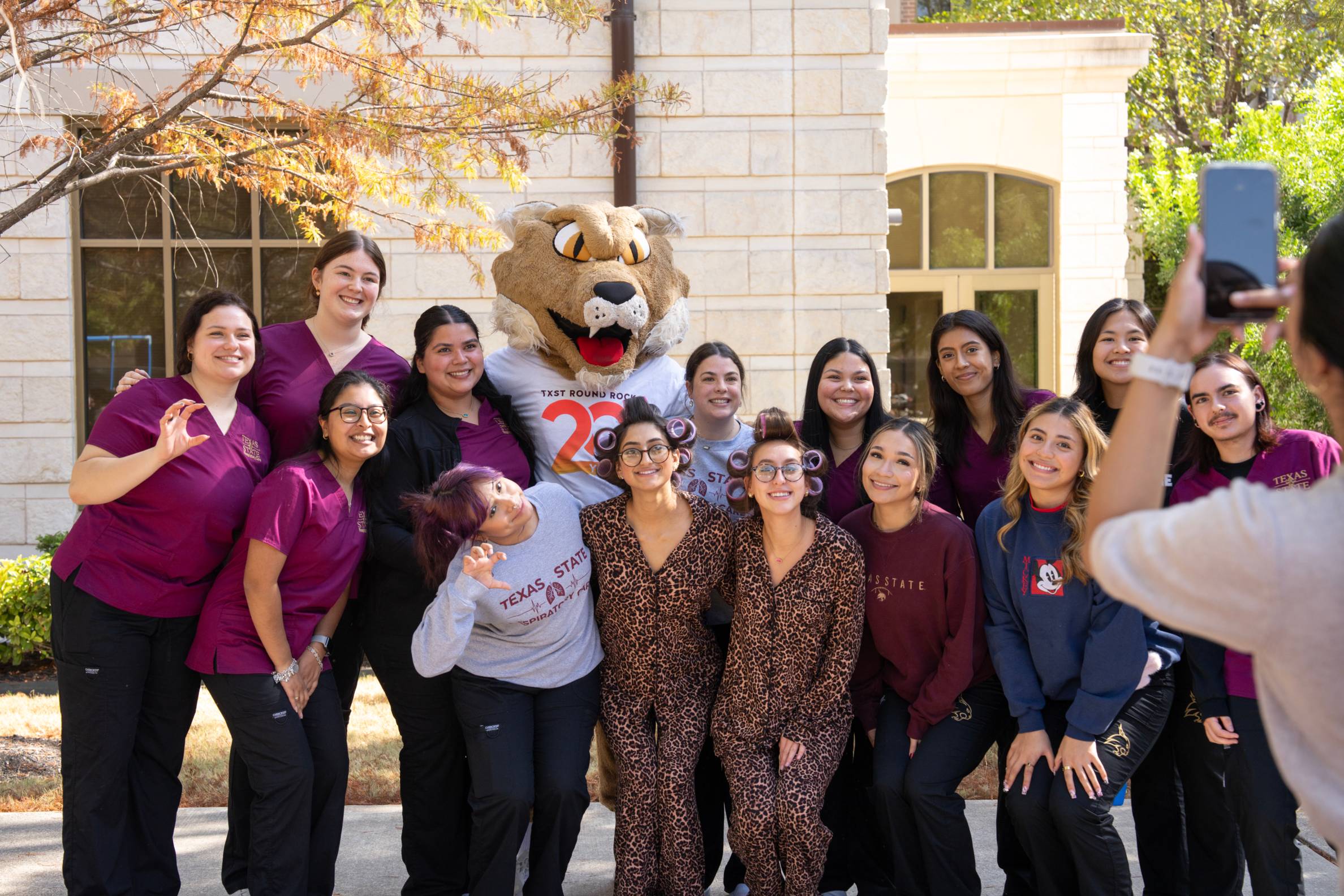 group picture with bobcat