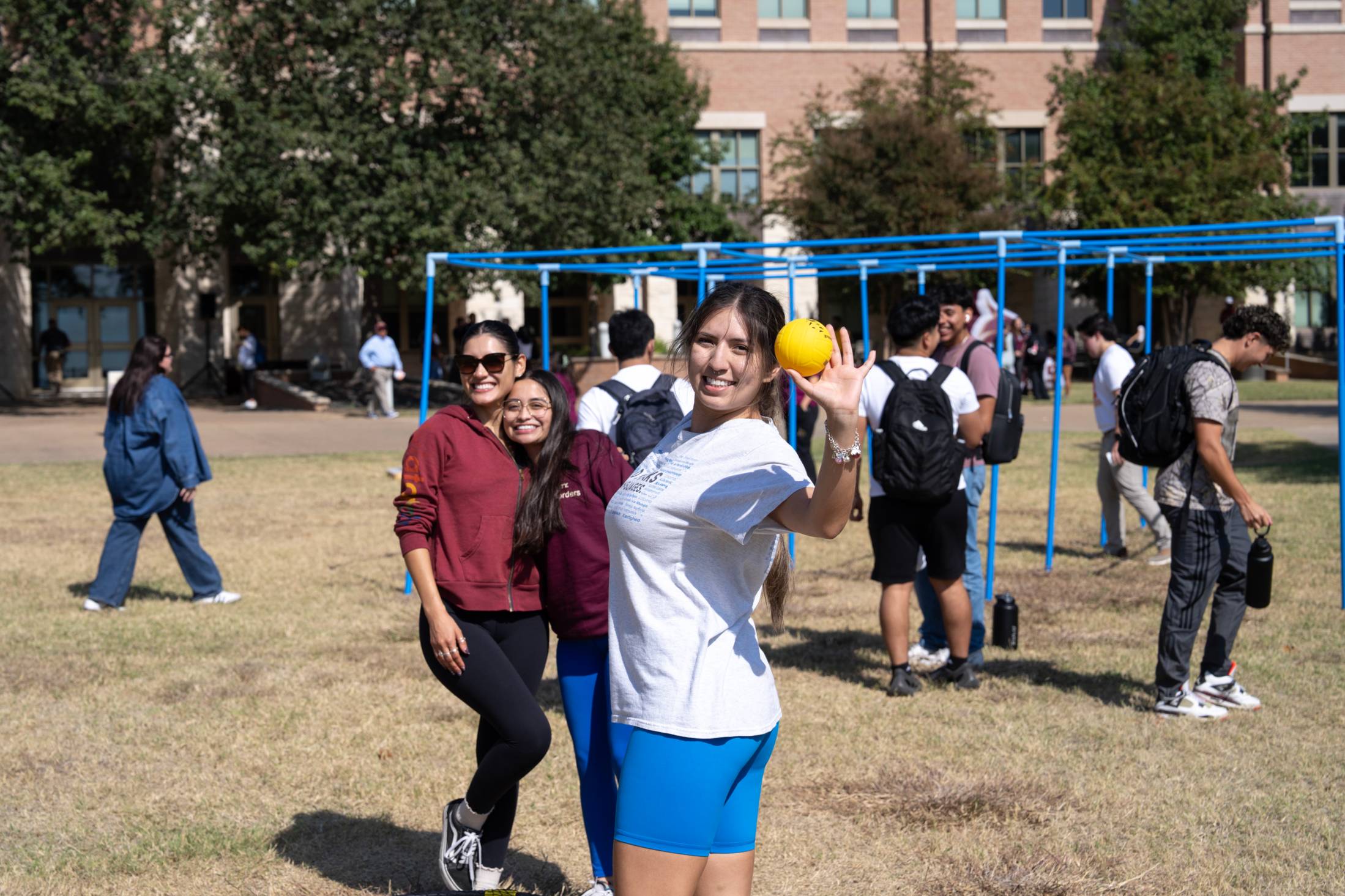 a student catching a ball