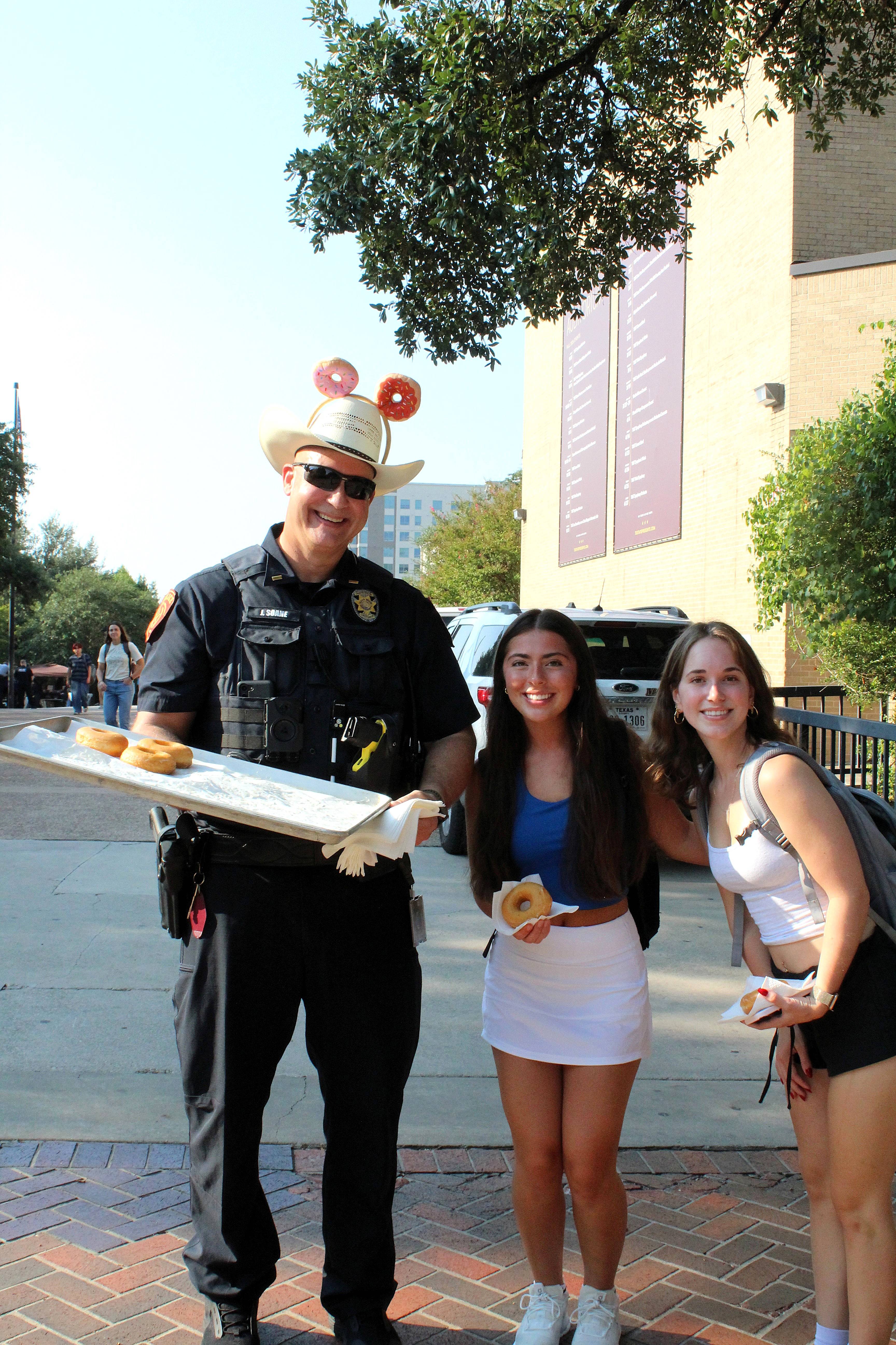 Soane with students at donut day 2025