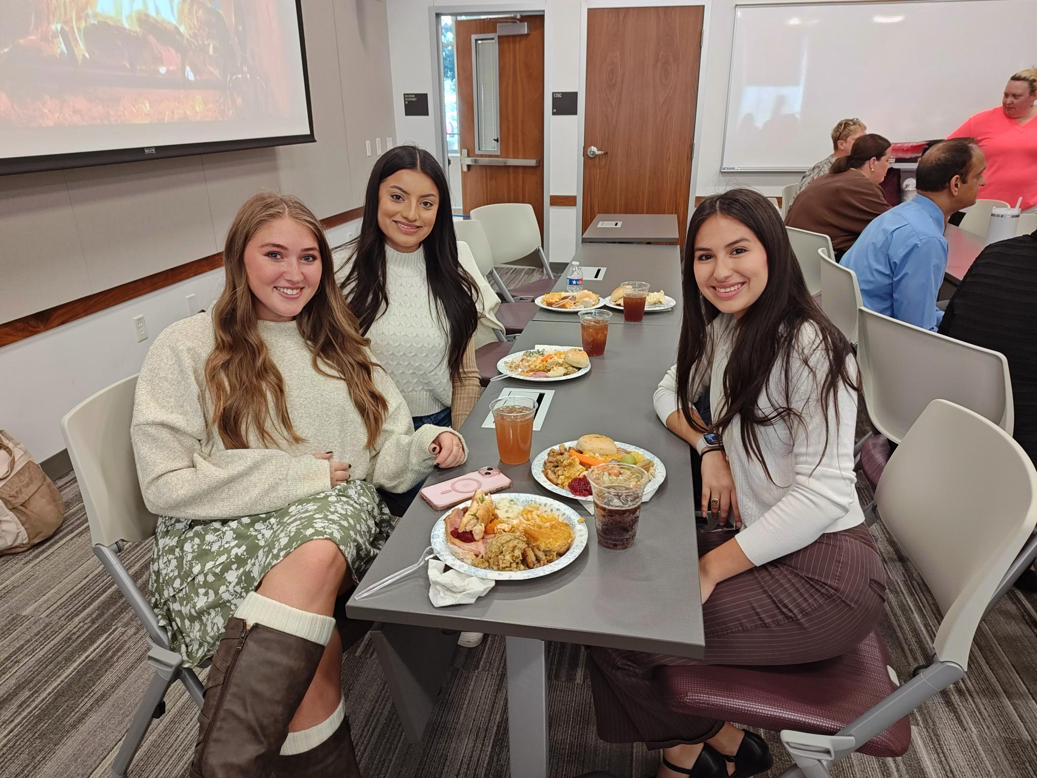 Students enjoying delicious food and each other's company.