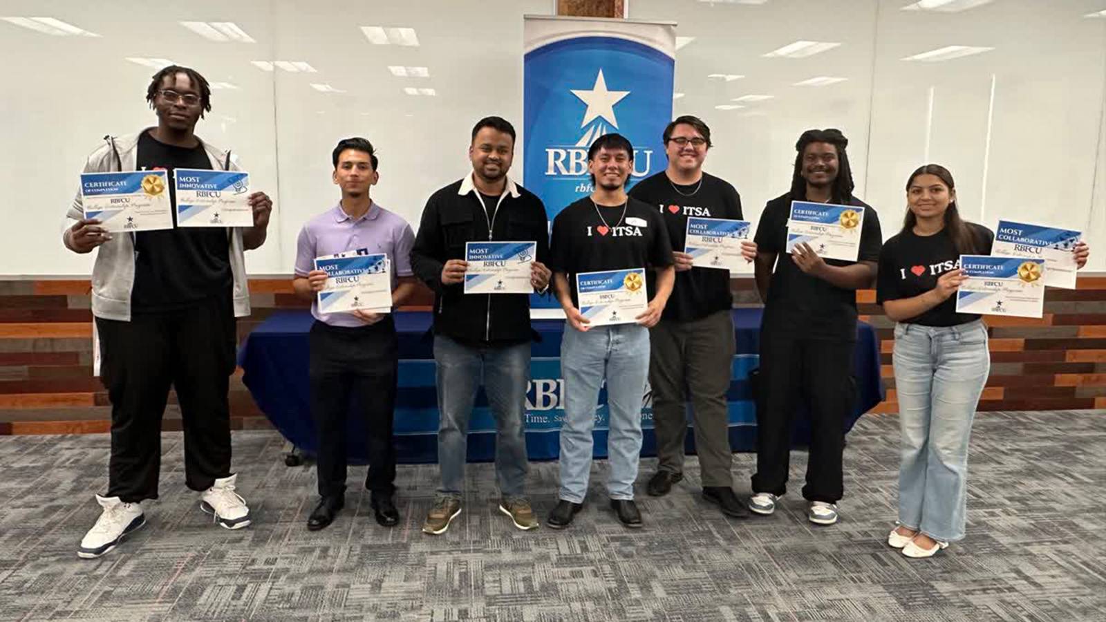 Seven college students holding certificates