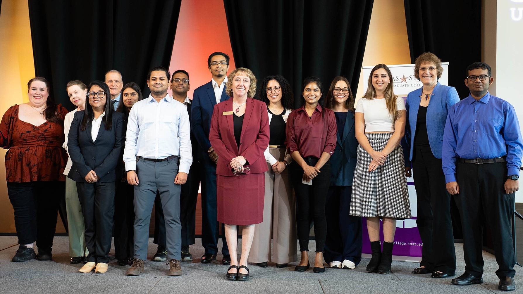 The 2025 3MT® Finalists photographed with Student Development Specialist Ashley Carrington, Associate Dean Patti Giuffre, and Dean Andrea Golato.