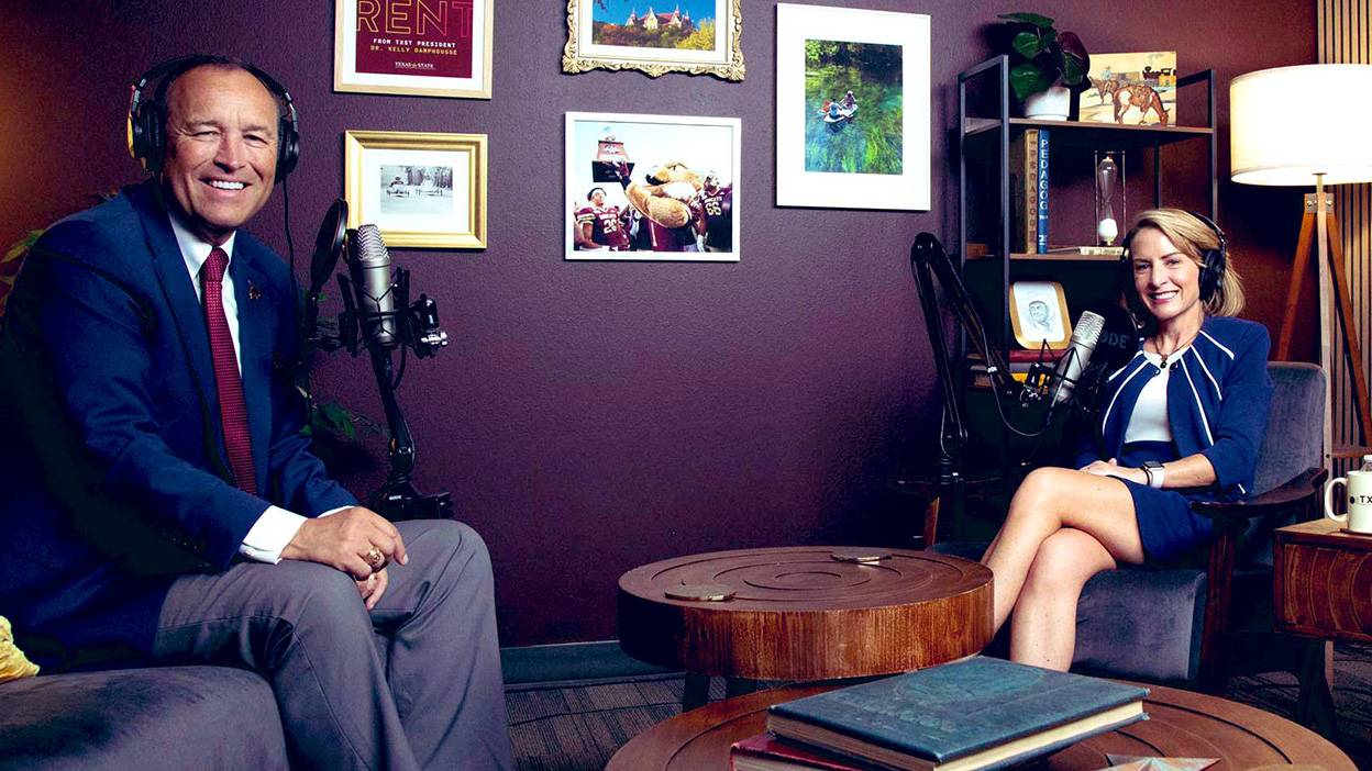 President Damphousse (left) poses for a photo with Julie Lessiter in the podcast studio.