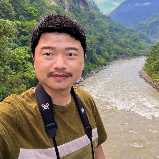 Headshot of Khandu in Zhemgang, Bhutan, a known habitat of the white-bellied heron.