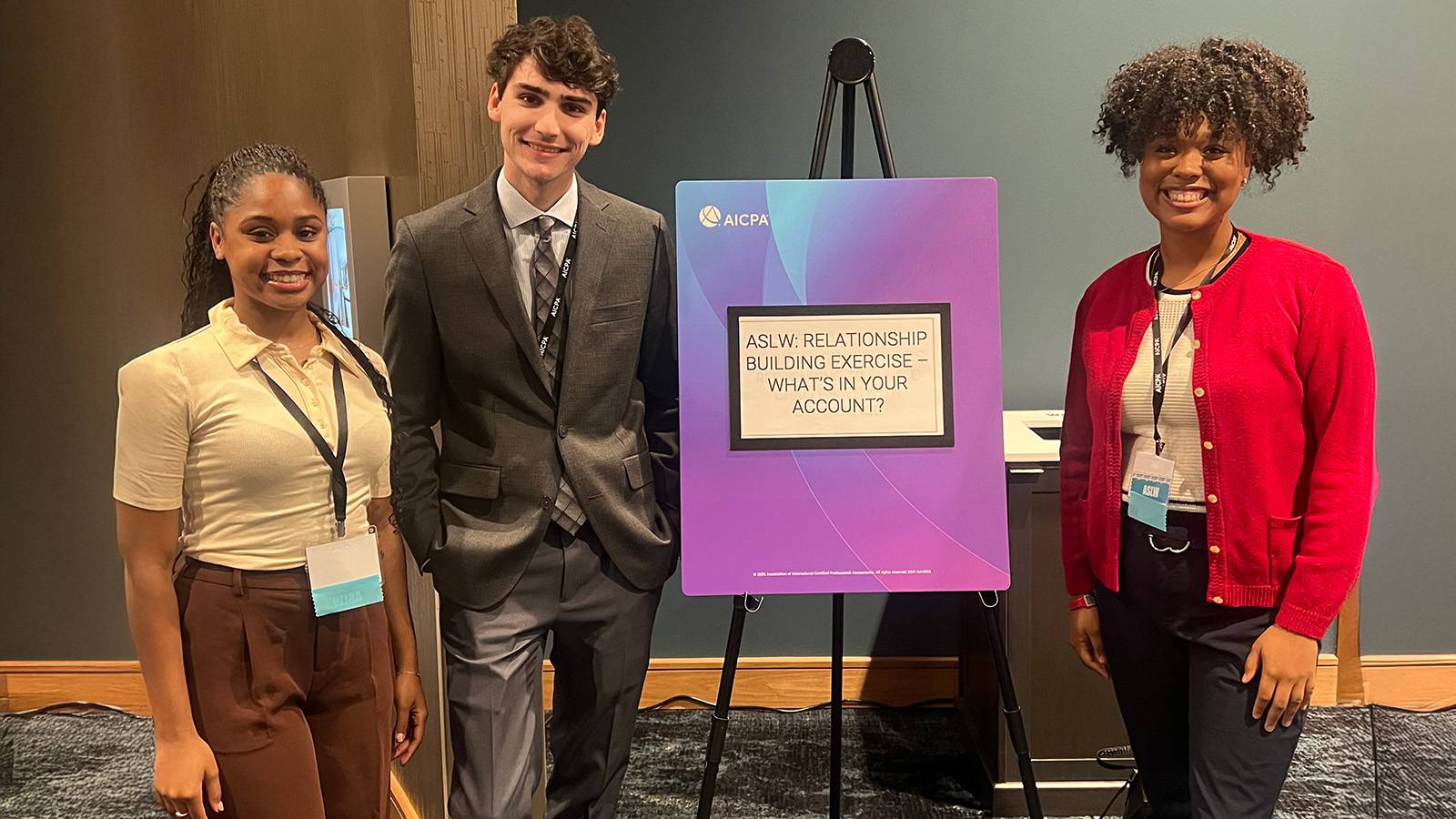 group of professionally dressed students at accounting leadership workshop