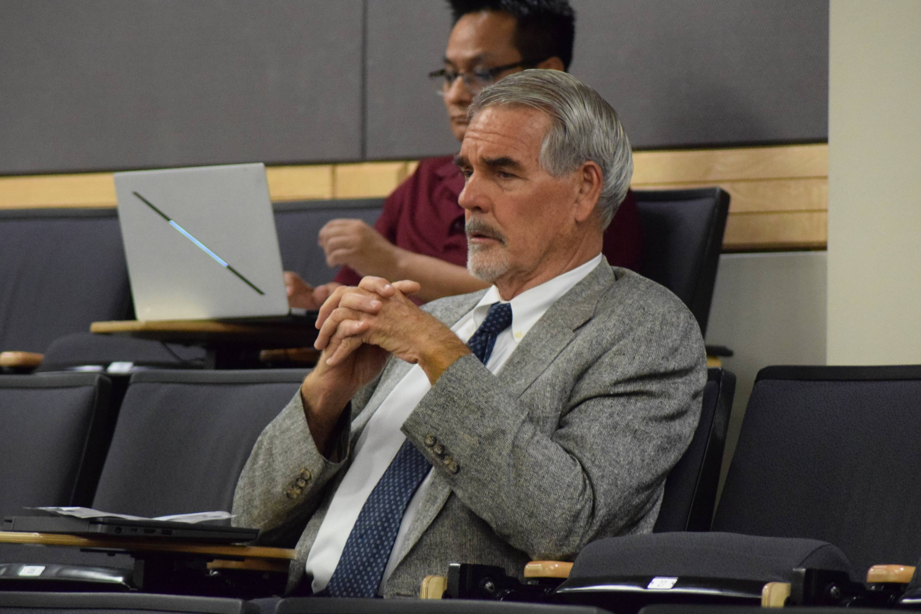 A man listens to presentations at Ignite 3.0.