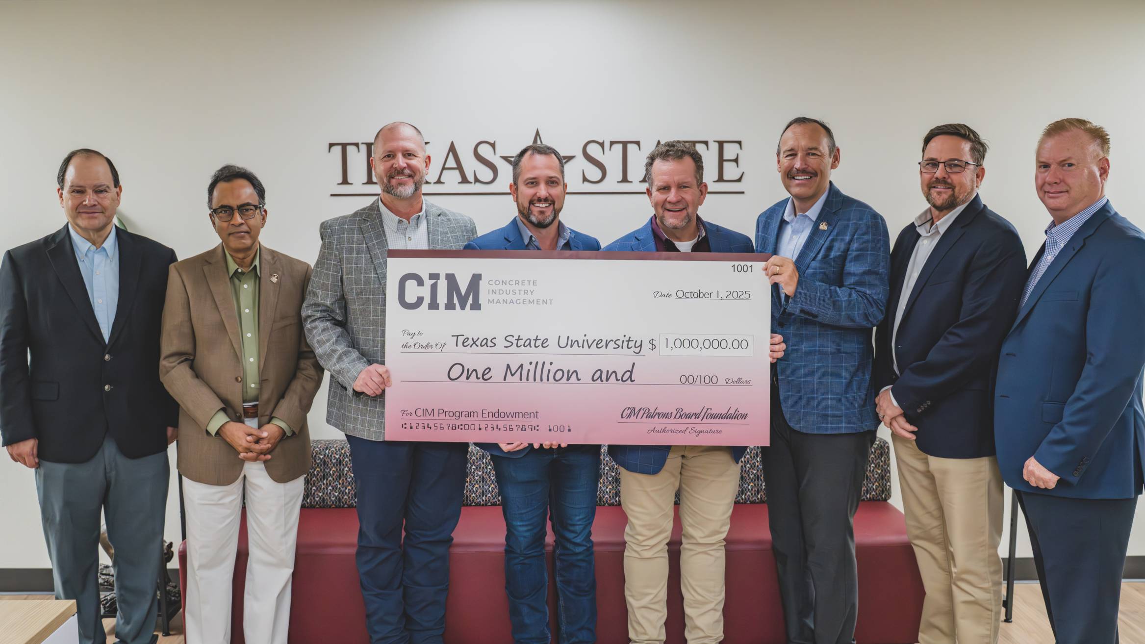 Texas State University leadership with members of the Concrete Industry Management Foundation holding a check for one million dollars