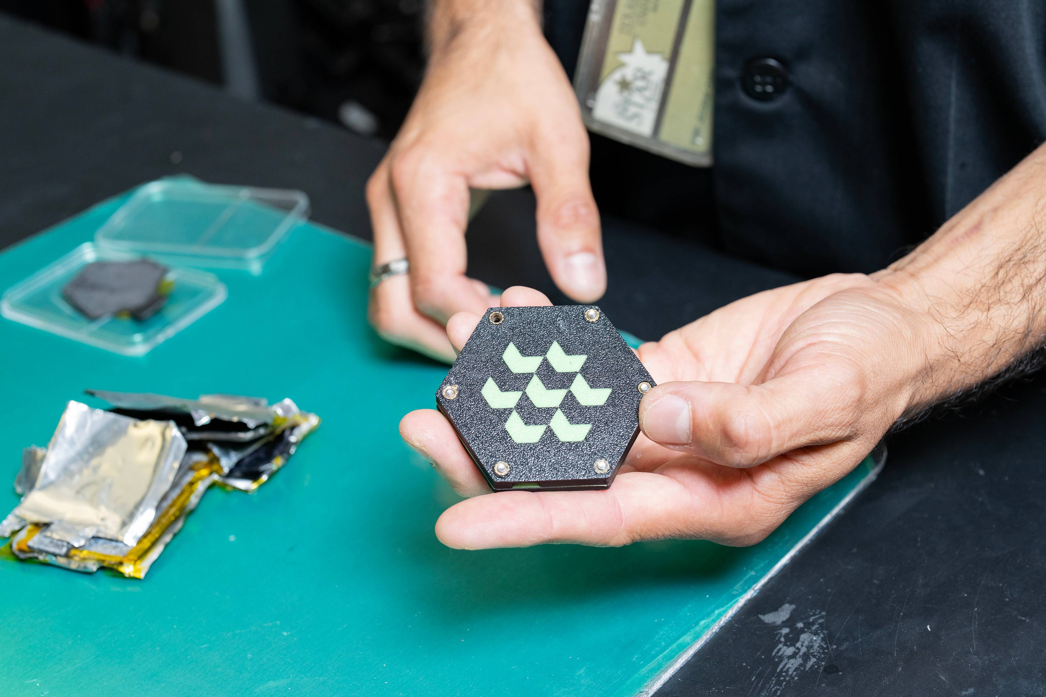 man holding 3d printed battery in hand