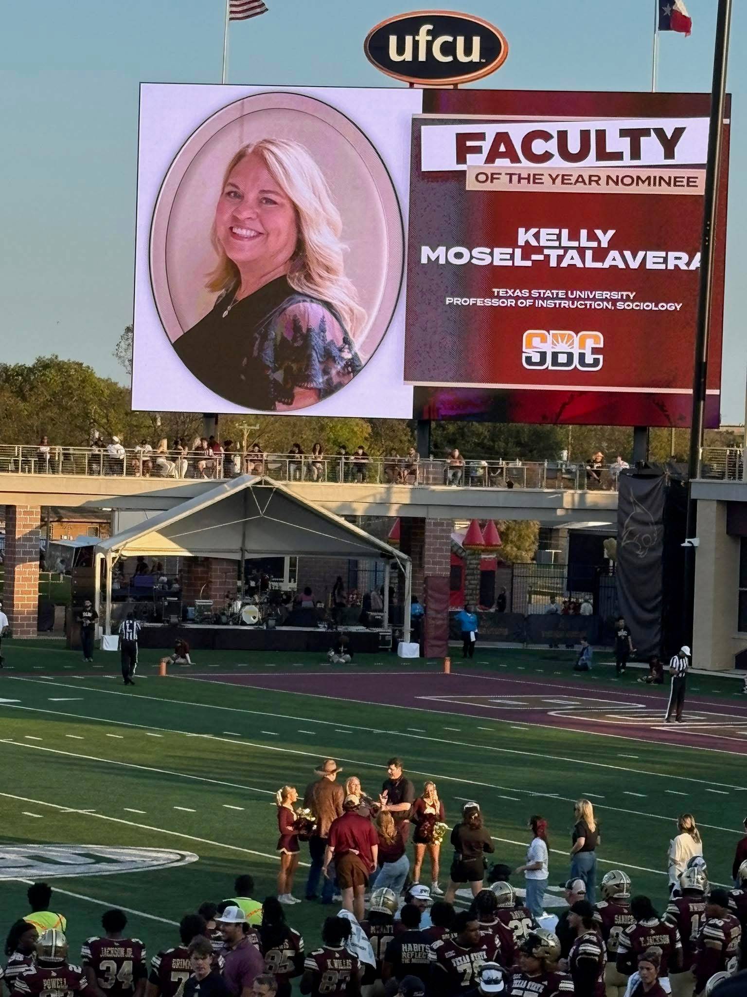 an image of Kelly Mosel Talavera being honored at the Texas State Football game