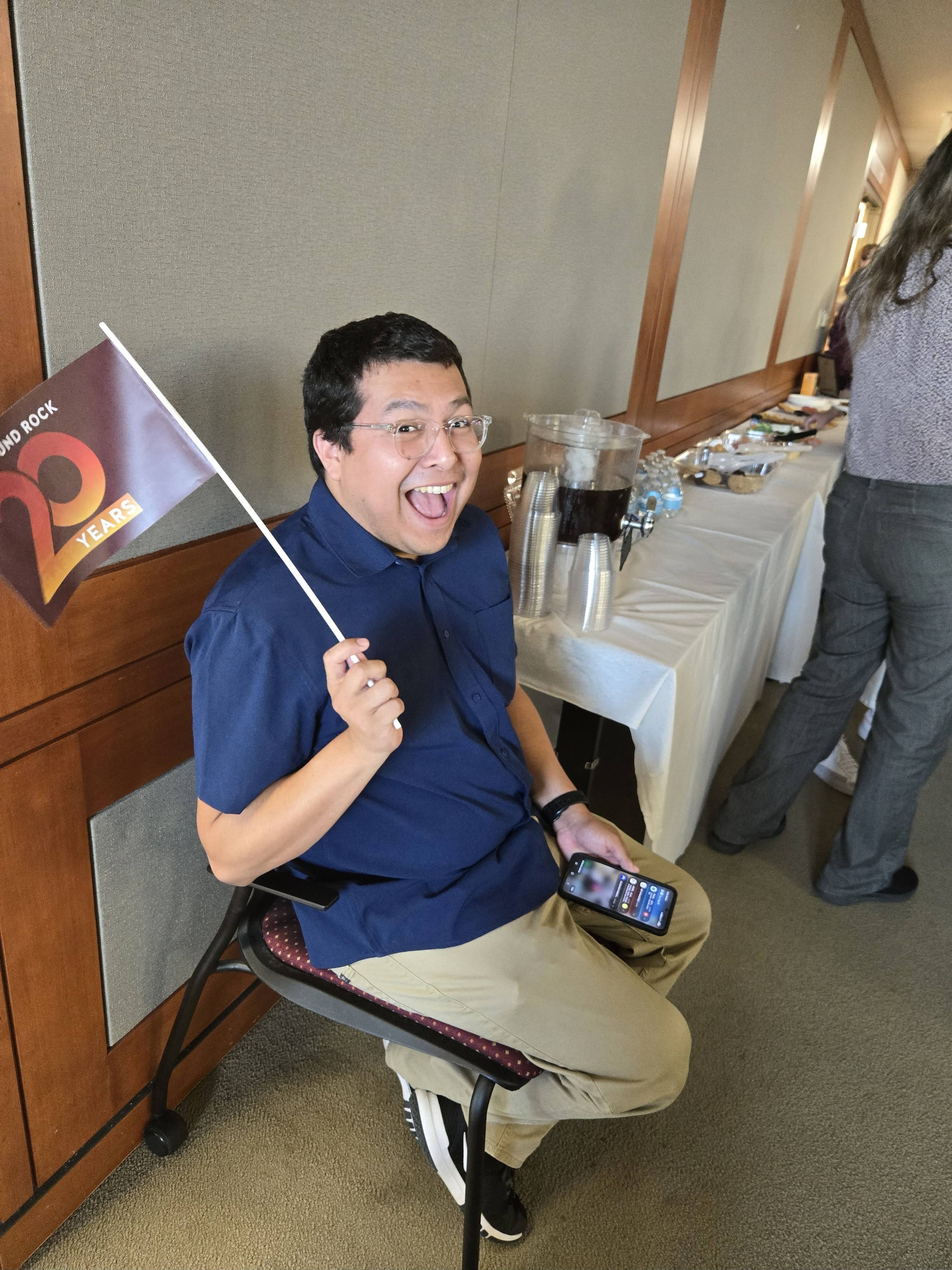 a staff holding a flag
